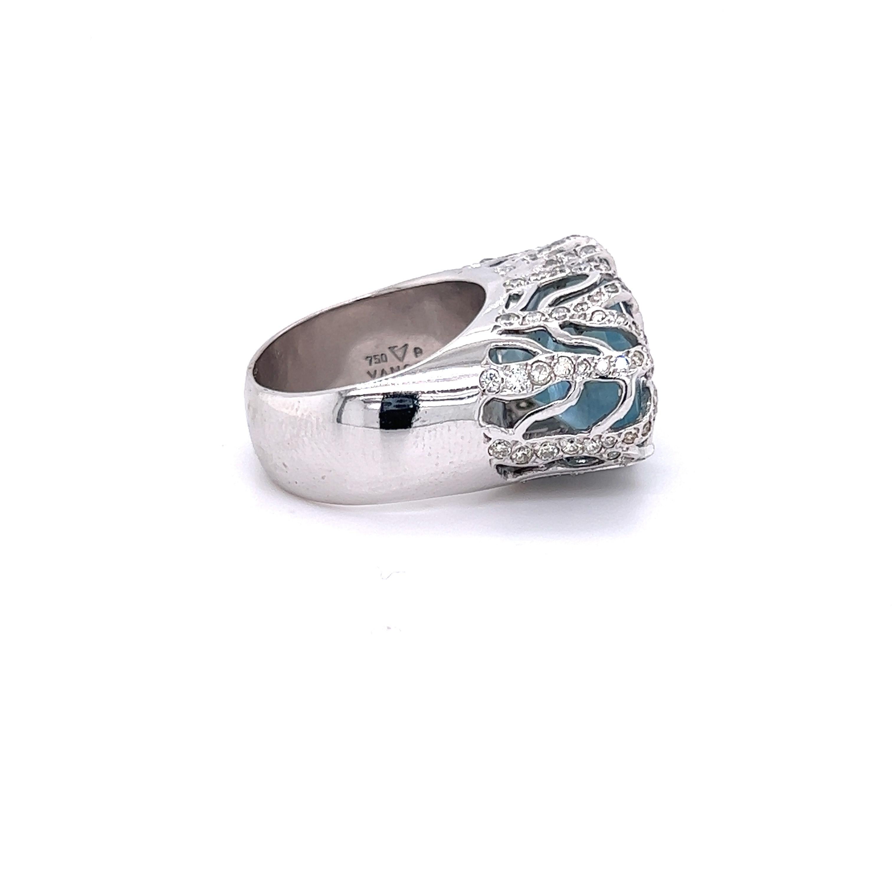 Vancox Designer 18K White Gold Diamond Cabochon Milky Aquamarine Cocktail Ring

This ring features a cabochon, oval cut Milky Aquamarine center with a natural inclusion running through the center.

Apprx. 1.10ct. diamonds total weight.

Ring face