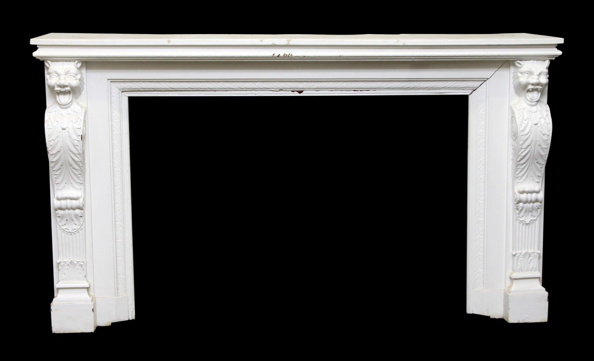 Antique hand carved white wood mantel with griffin on sides. This figural mantel is from the former Gloria Vanderbilt estate located at 39 E. 72nd St, Manhattan, NYC. It is in its original state with no alterations. This can be seen at our 400