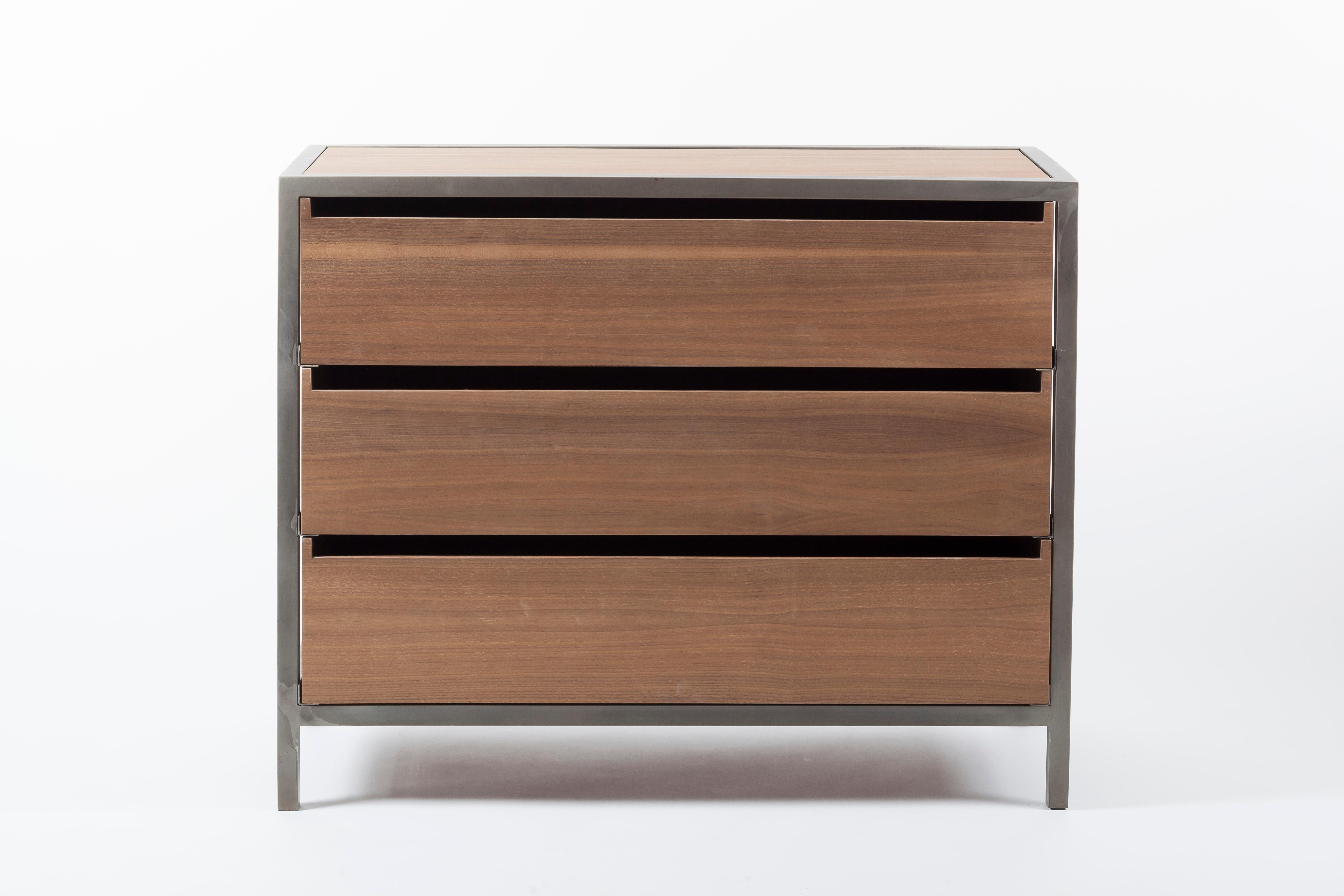 The Vaneau Chest consists of three beautiful veneered drawers, hand made from beech plywood, that slide into a hand-polished and hand welded steel frame. The drawers are hand veneered with oak or american walnut, from FSC certified european forests.