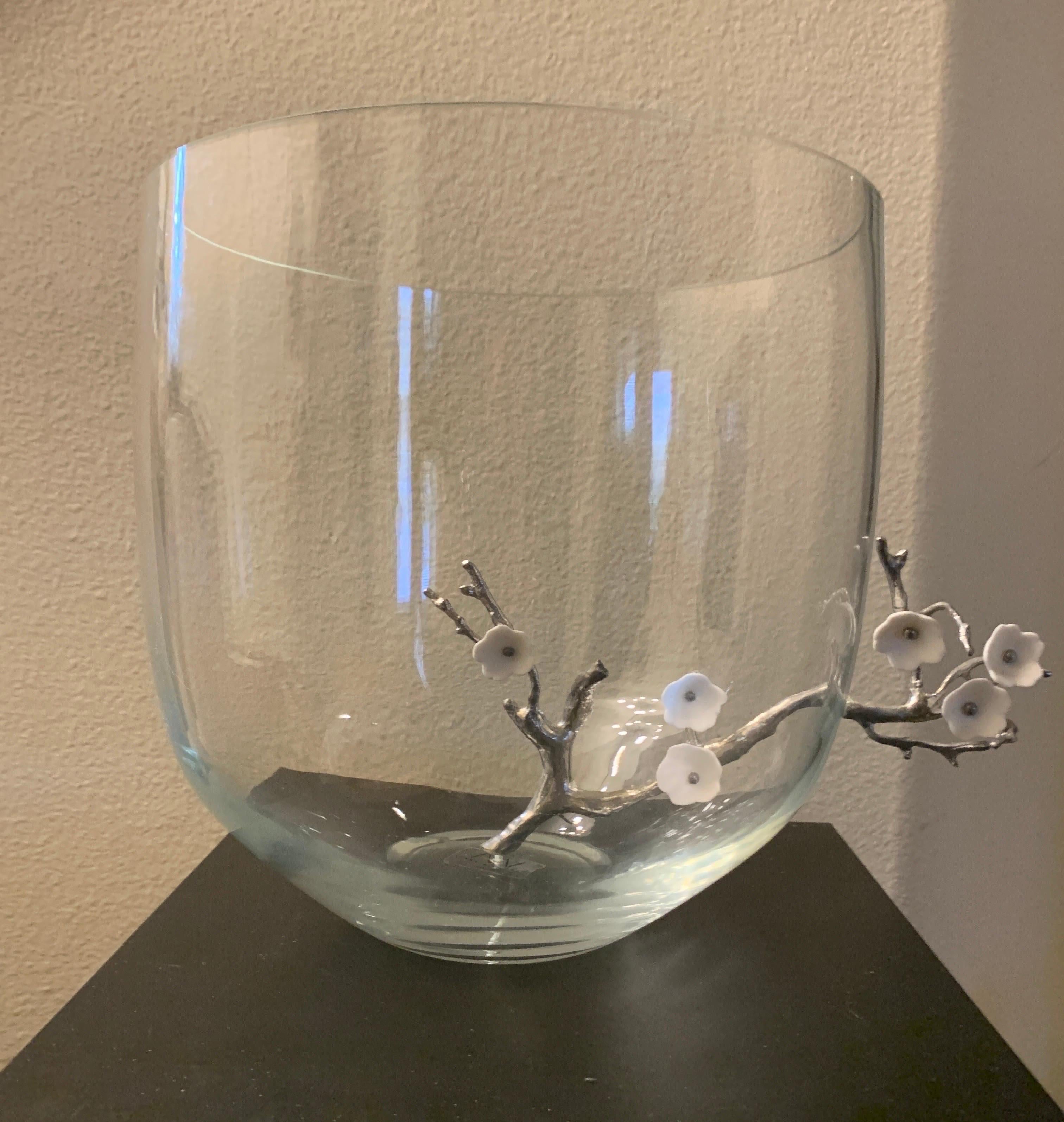 This is the large version of a glass cherry blossom bowl by French designer Vanessa Mitranii. The metal cherry blossom came in 2 size bowls and also some glass cups. This larger bowl has a shortened cherry blossom inside the vessel and continues to