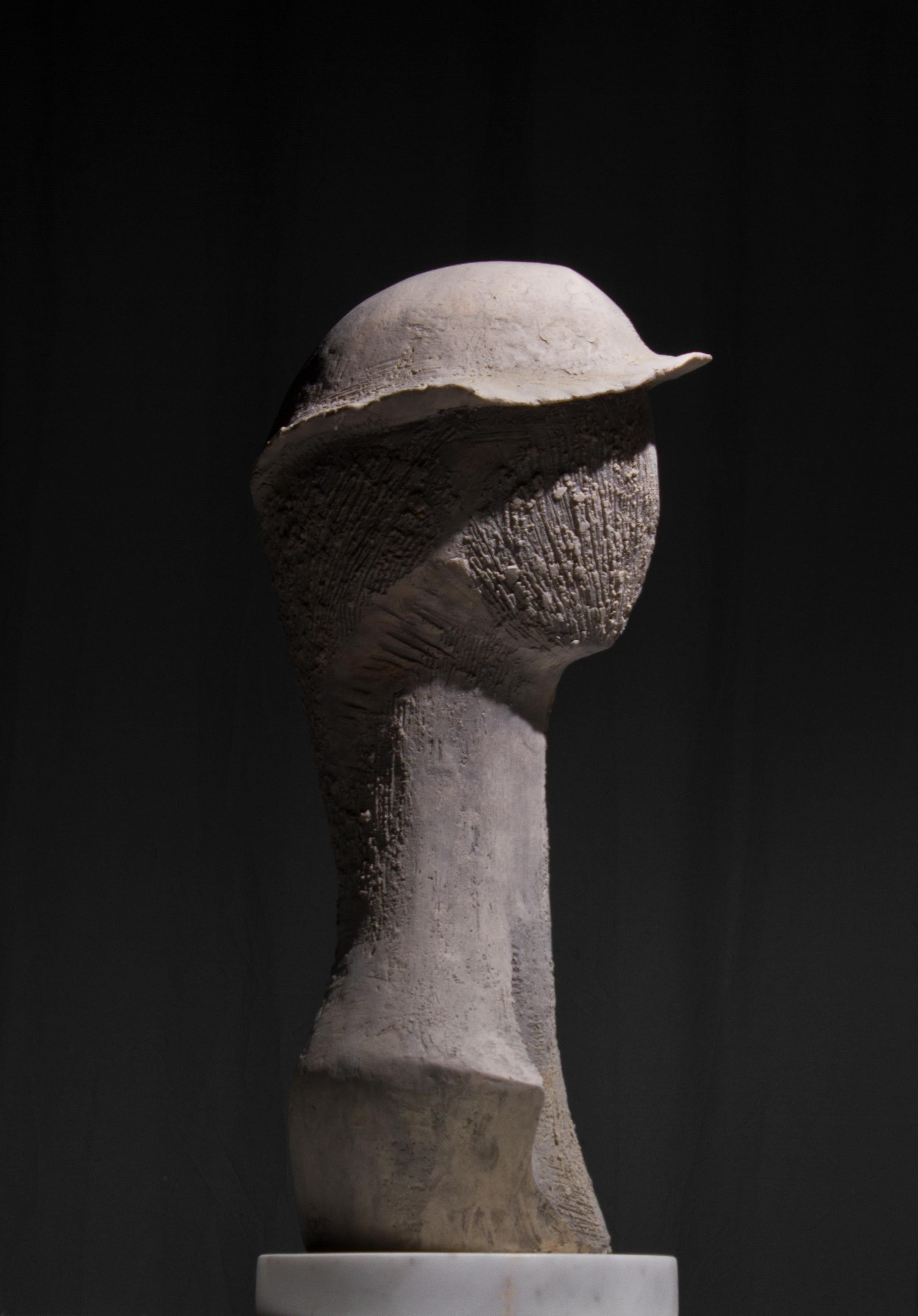 Ceramic abstract face with hat
8.5 x 19.6 x 8.0, 2.2 lbs 
Ceramic
Hand signed by artist 

Artist's Commentary: 
