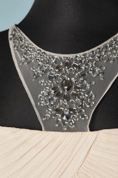 Vanilla silk chiffon cocktail dress with rhinestone embellishment
