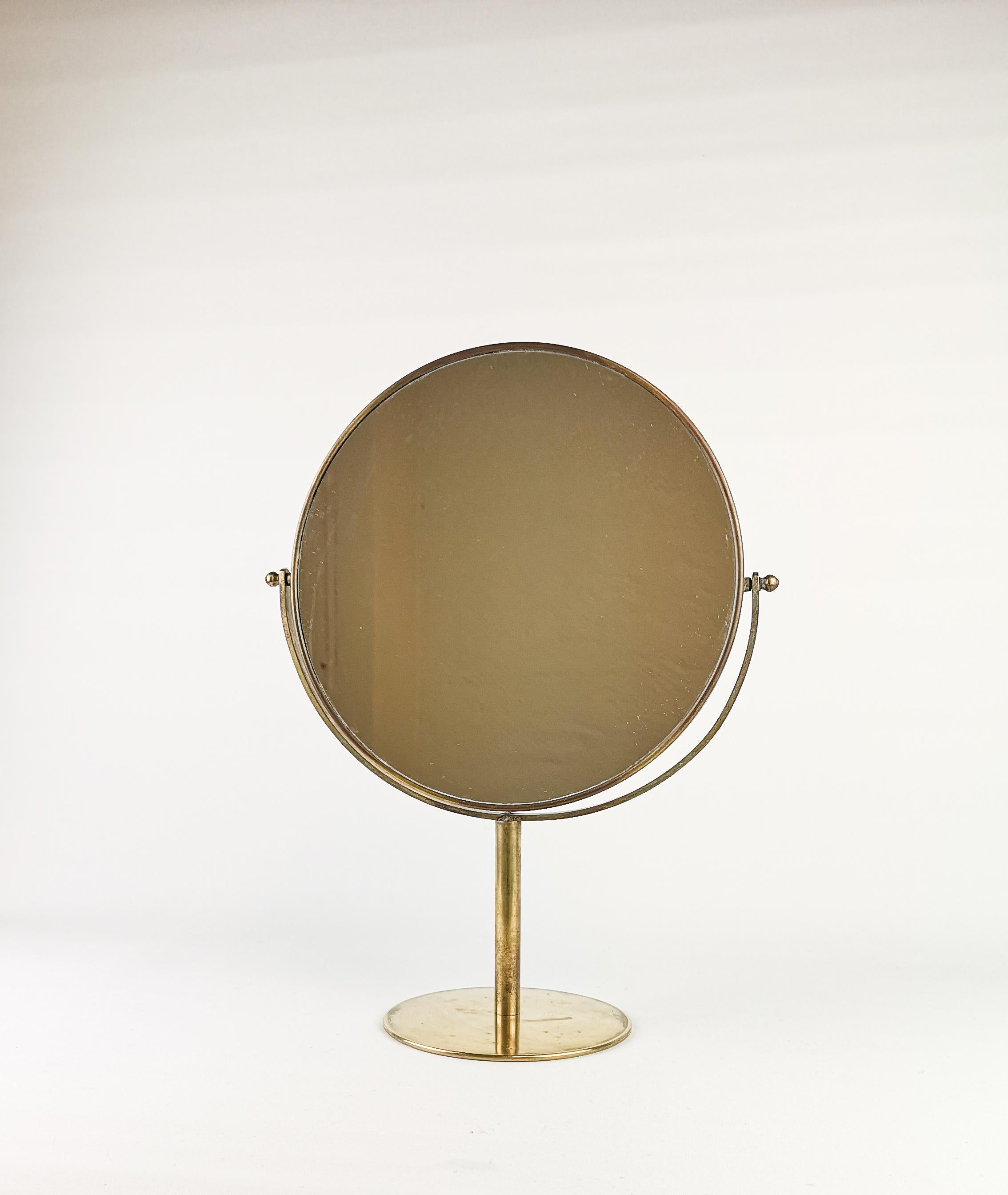 A wonderful vanity brass mirror made in Sweden possible for Svenk Tenn. Nice vintage use with sings of use but in very good condition.
