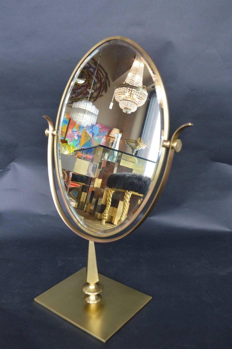 Brass vanity mirror by Charles Hollis Jones.
Dimensions:
27