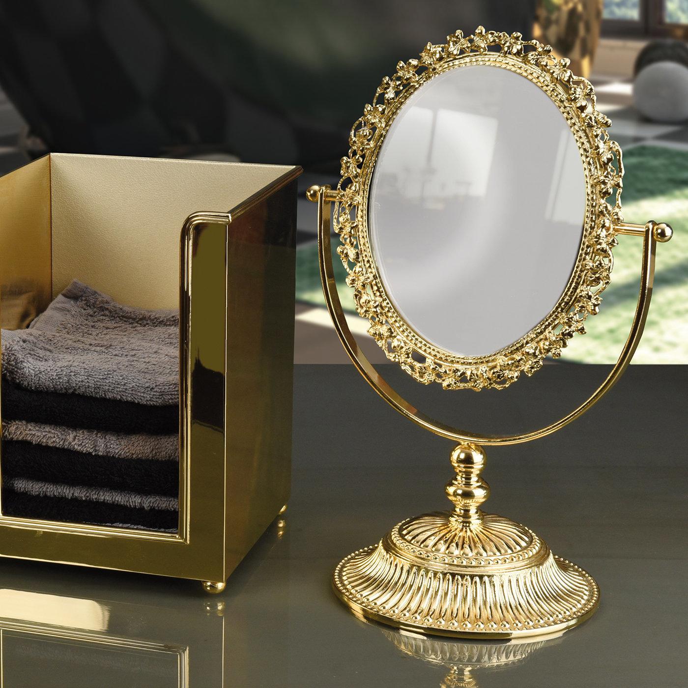 Brimming with lavish allure, this exceptional mirror will superbly complement a vanity table in a refined interior of either classic or modern inspiration. Timelessly elegant, its stupendously detailed design is handcrafted of brass finished with