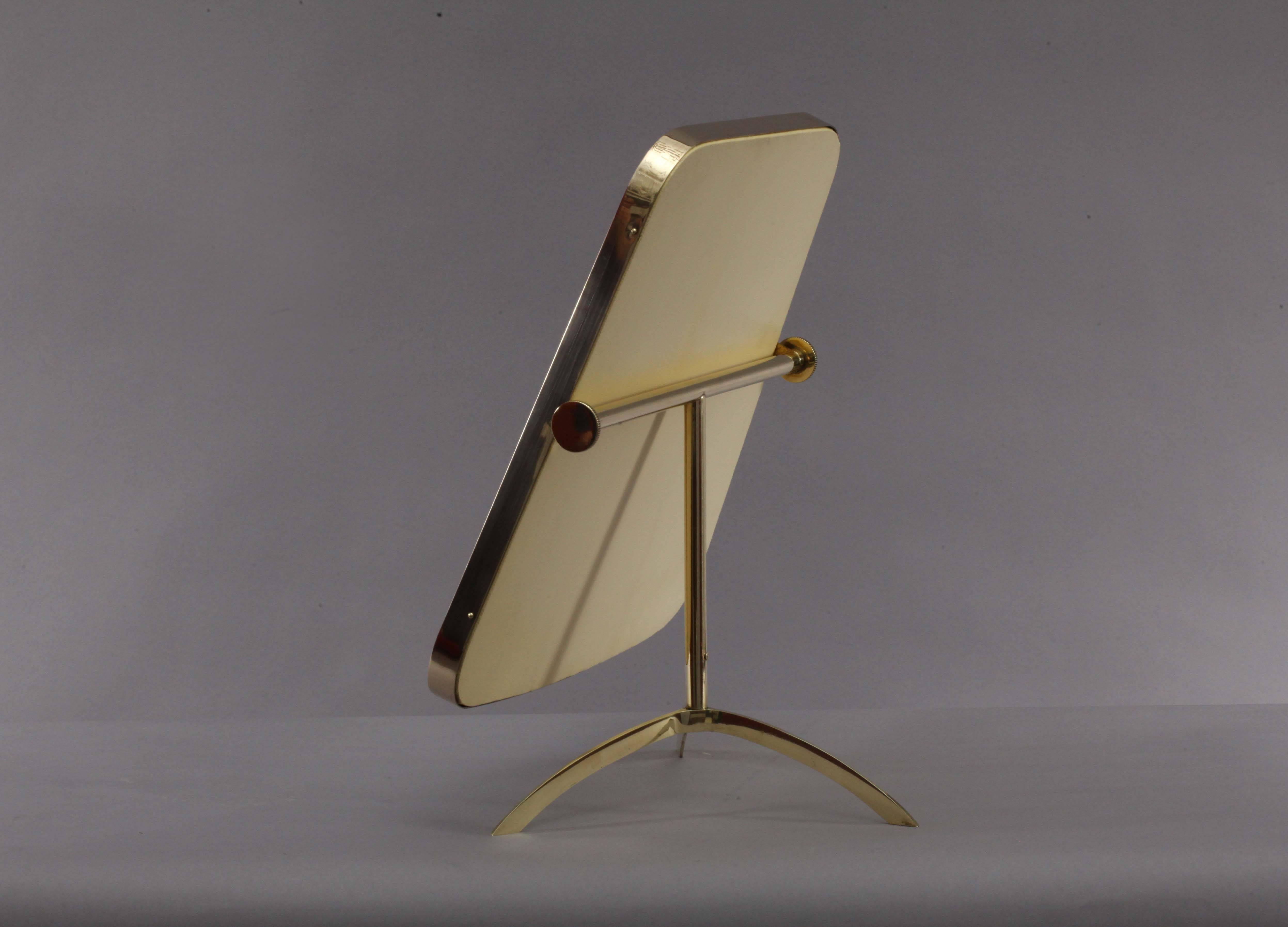 Vanity mirror,
Münchner Werkstätten,
Germany, 1960
brass base.