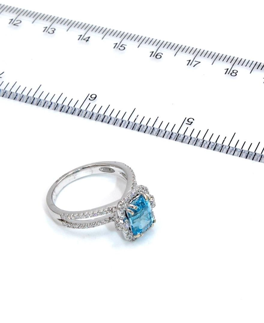 Emerald Cut 18K White Gold Vanna K Halo Ring with Swiss Blue Topaz and Diamonds For Sale