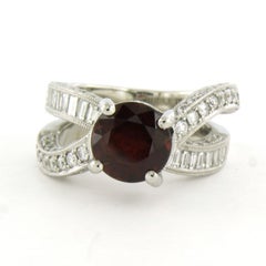Vanna K - Platinum ring with garnet, brilliant and baguette cut diamond 2.50ct
