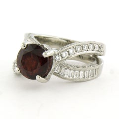 Vanna K - Platinum ring with garnet, brilliant and baguette cut diamond 2.50ct