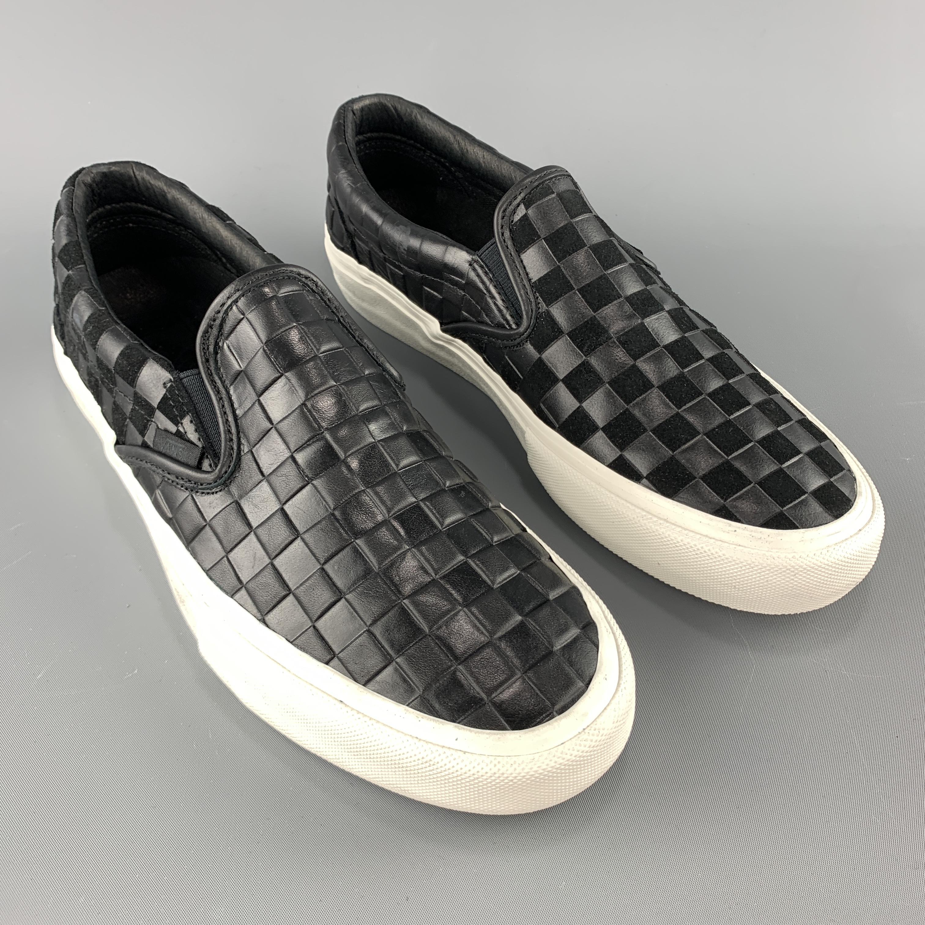VANS x ENGINEERED GARMENTS Spring Summer 2019 slip on sneakers come in black checkered embossed leather with one sueded front panel,  one sueded heel panel, and rubber sole. 

New with Box. 
Marked: 9.5