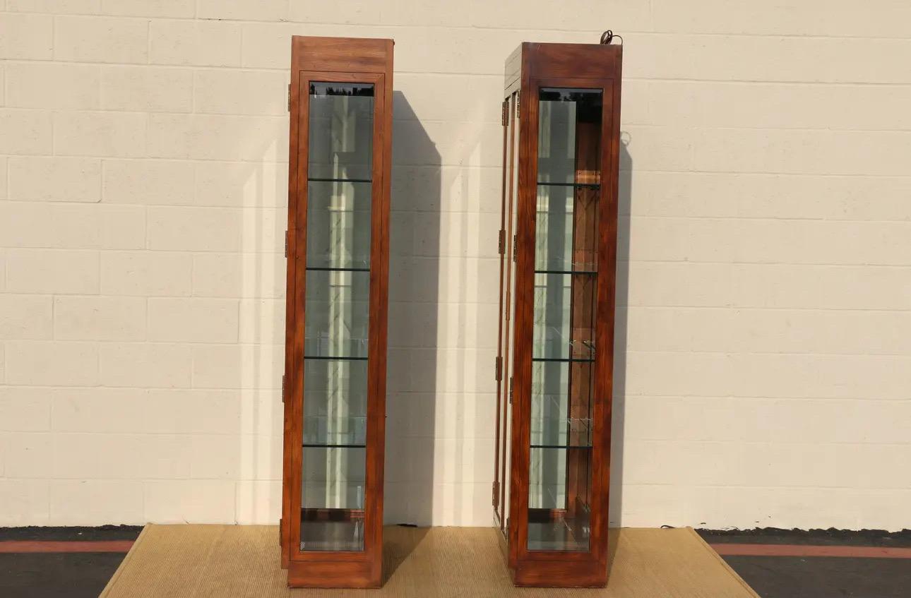 American Vantage Pair of Campaign Style Curio Display Cabinets by Henredon For Sale