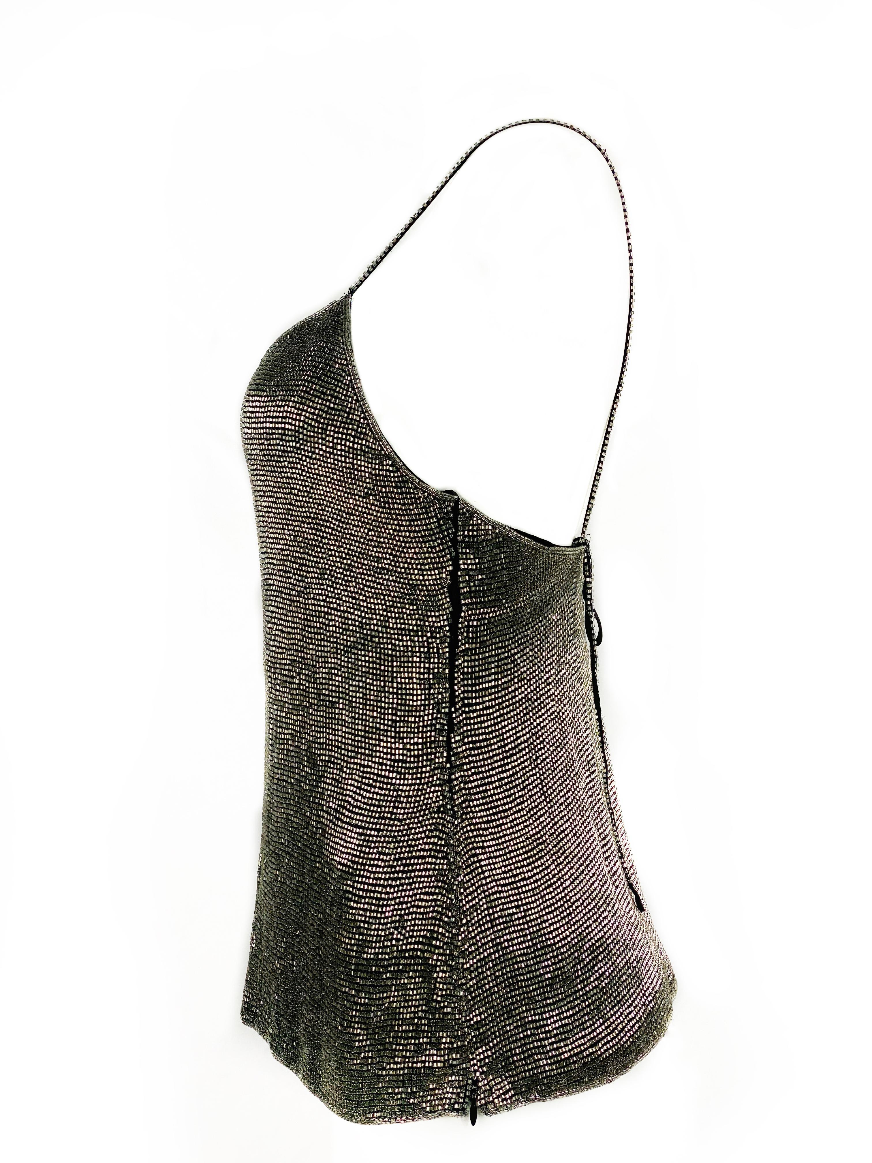 Vantage RALPH LAUREN Black Silk Slip Tank Evening Top w/ Rhinestones

Product details:
Brand and size tags are missing
100% silk
Featuring noodle straps measure 4.75” front, 11.5” back
Noodle strap drop detail
Side zip closure 
Made in USA
