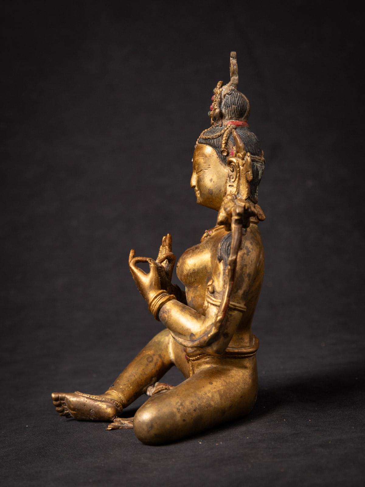 Old bronze Nepali Green Tara statue
Material : bronze
20,3 cm high
14,1 cm wide and 12,2 cm deep
Fire gilded with 24 krt. gold
Dharmachakra mudra
Middle 20th century
Inlaid with real gemstones
Weight: 1,31 kgs
Originating from Nepal
Nr: 3709-29