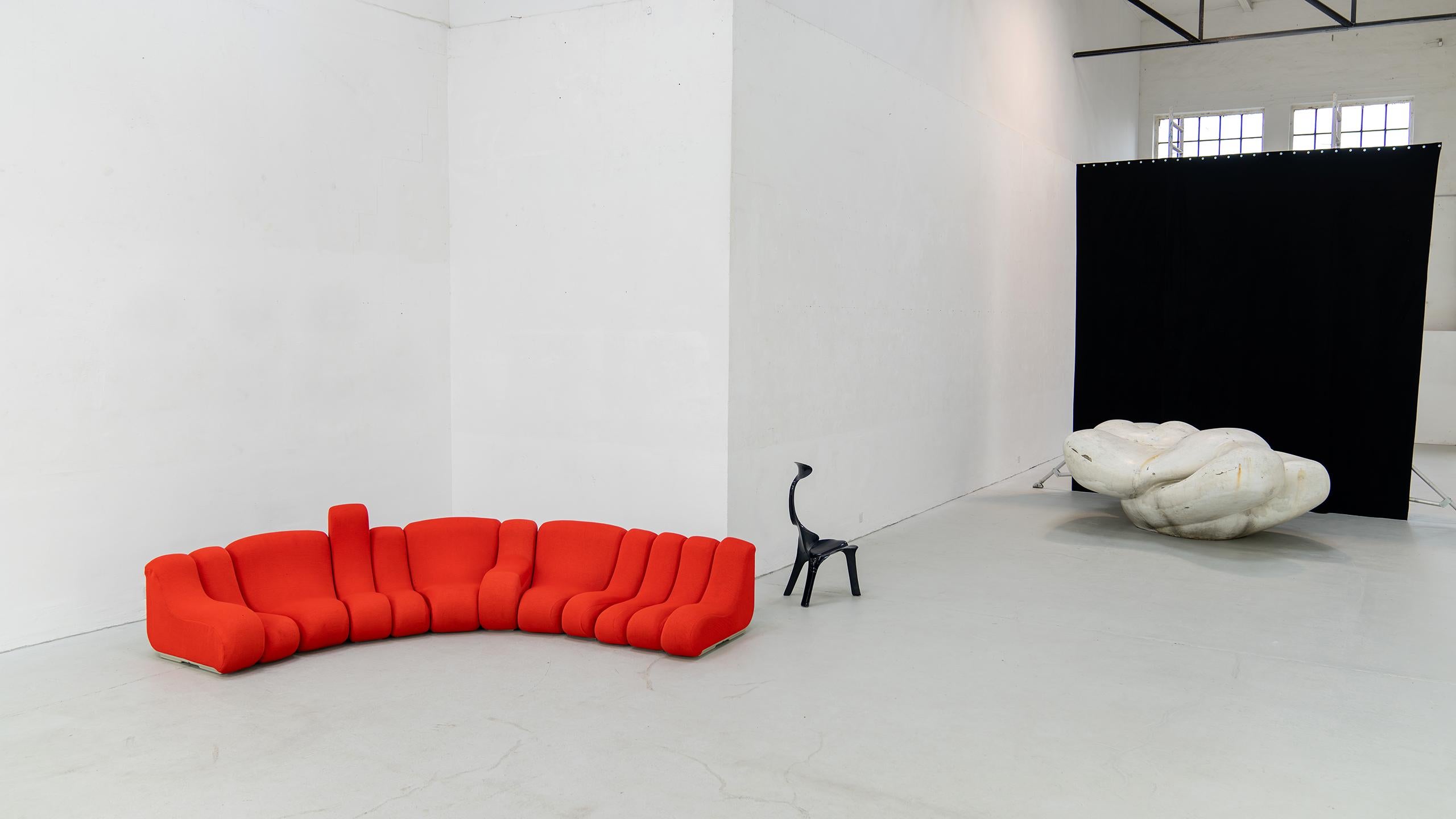 This exuberant buildable sofa is designed by Burkhard Vogtherr in 1969 for Rosenthal, Germany.
A very rare modular sofa consisting of freely arrangeable 12x seating elements.

The frames of the elements are produced in moulded plastic / fiberglass