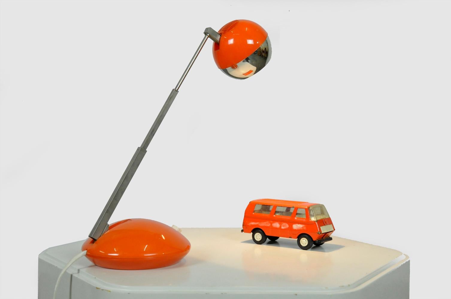 Various telescopic table lamps designed by Koch Creations Lynbrook NYC and produced by Eichhoff Werke, 1970s Germany. Four types of orange desk lamps with telescopic arm.

A/ desk lamp E3371 with orange bulb and spherical stand. B/ desk lamp E3372