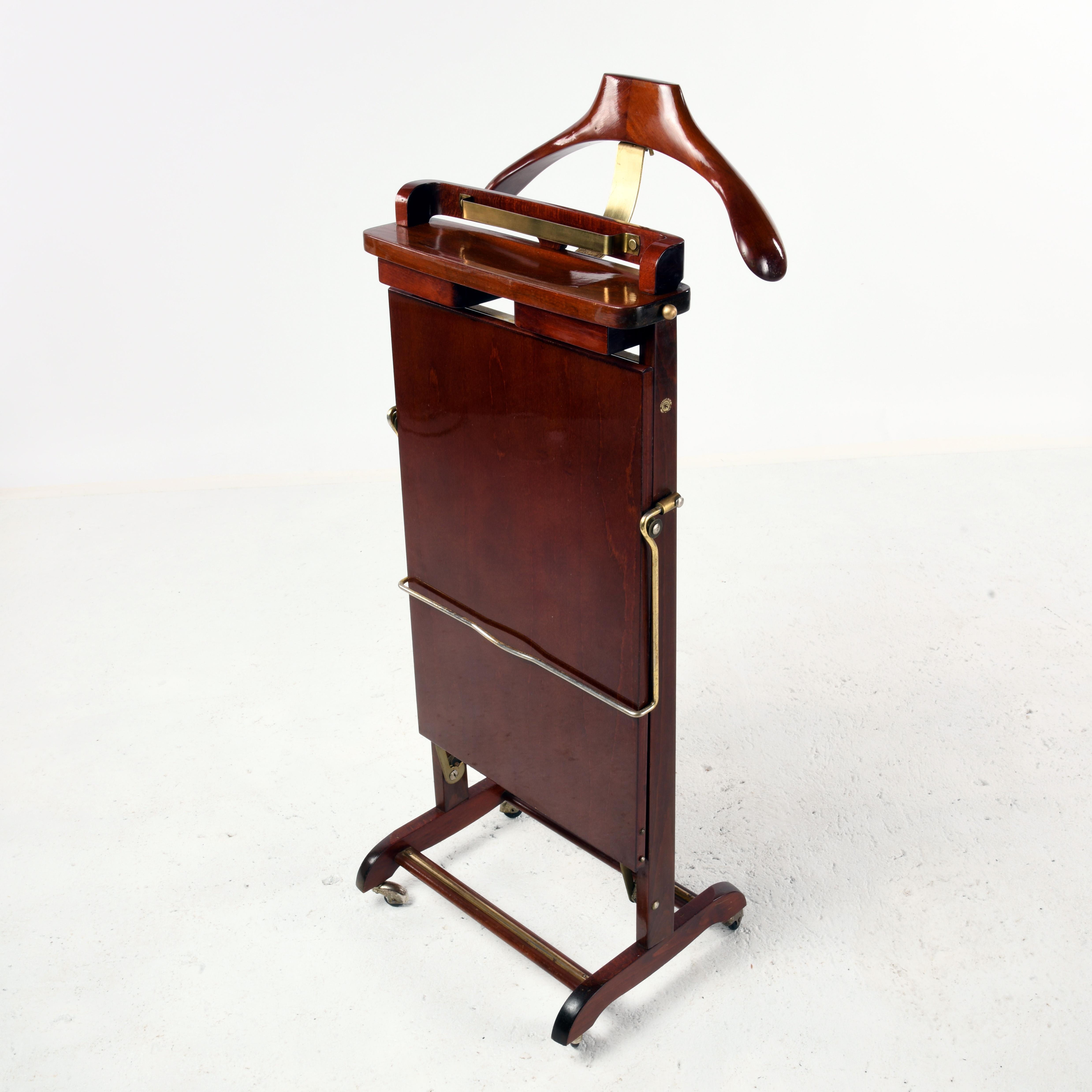 Mid-20th Century Varnished mahogany valet produced in Italy in the 1960s by Fratelli Reguitti
