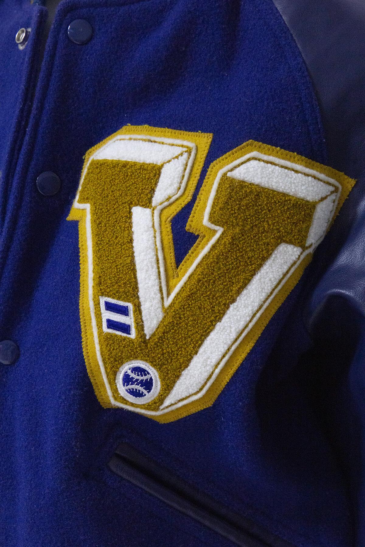 Varsity blue and yellow jacket College  5
