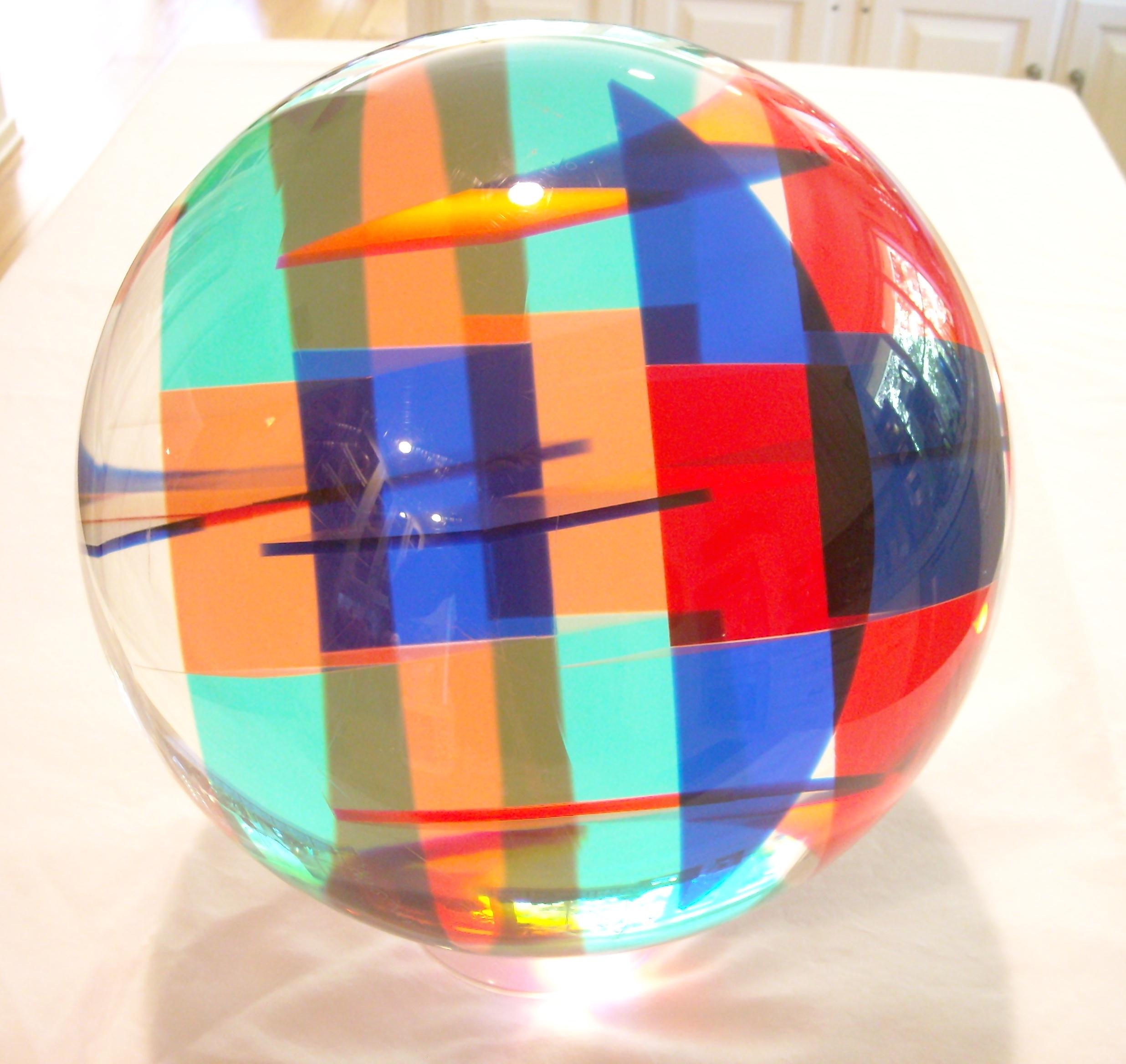 Great acrylic sphere by the well known artist Vasa. Comes with a clear base aprox 2 inches high, the sculpture /ball is 10 inches diameter. Signed and dated 1986 and archive # 2748.