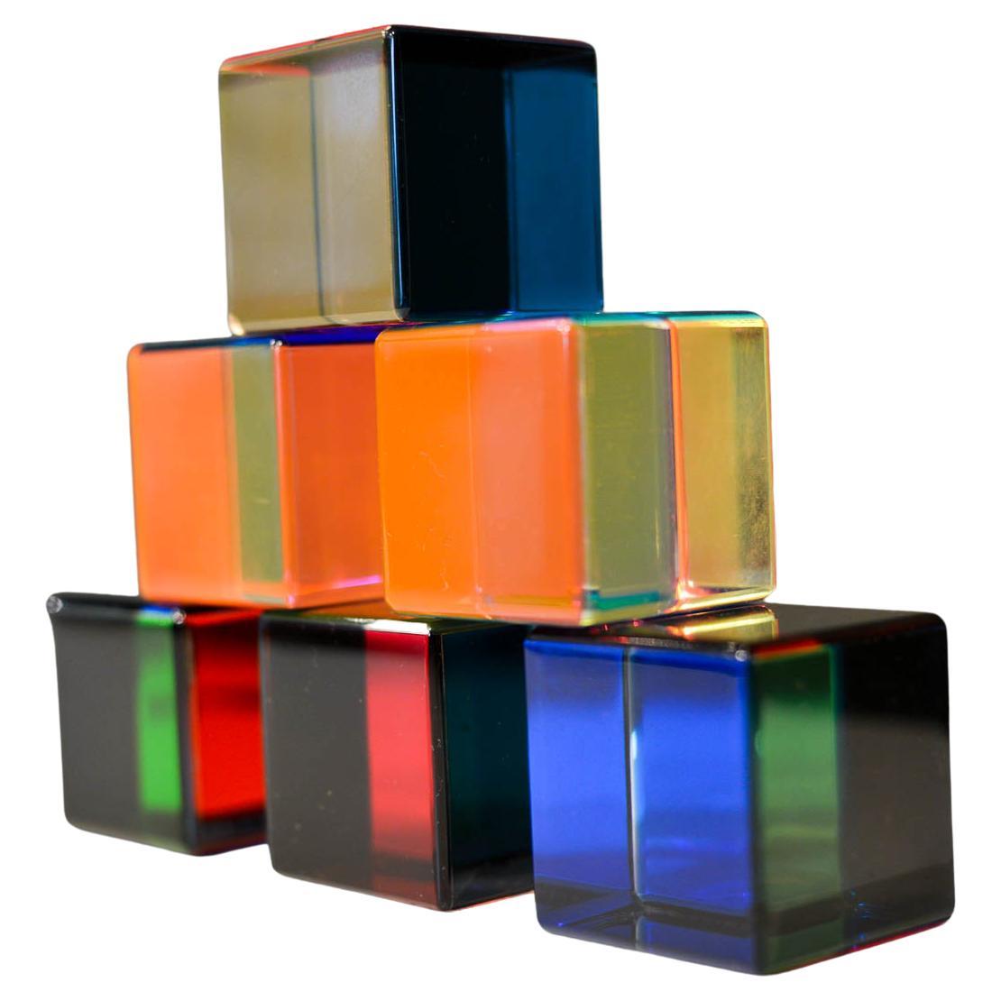 Set of 6 interchangeable colored lucite cubes by Vasa Velizar Mihich, 2011. Signed and dated in very good condition with only slight wear to each cube. Measures each 2.25