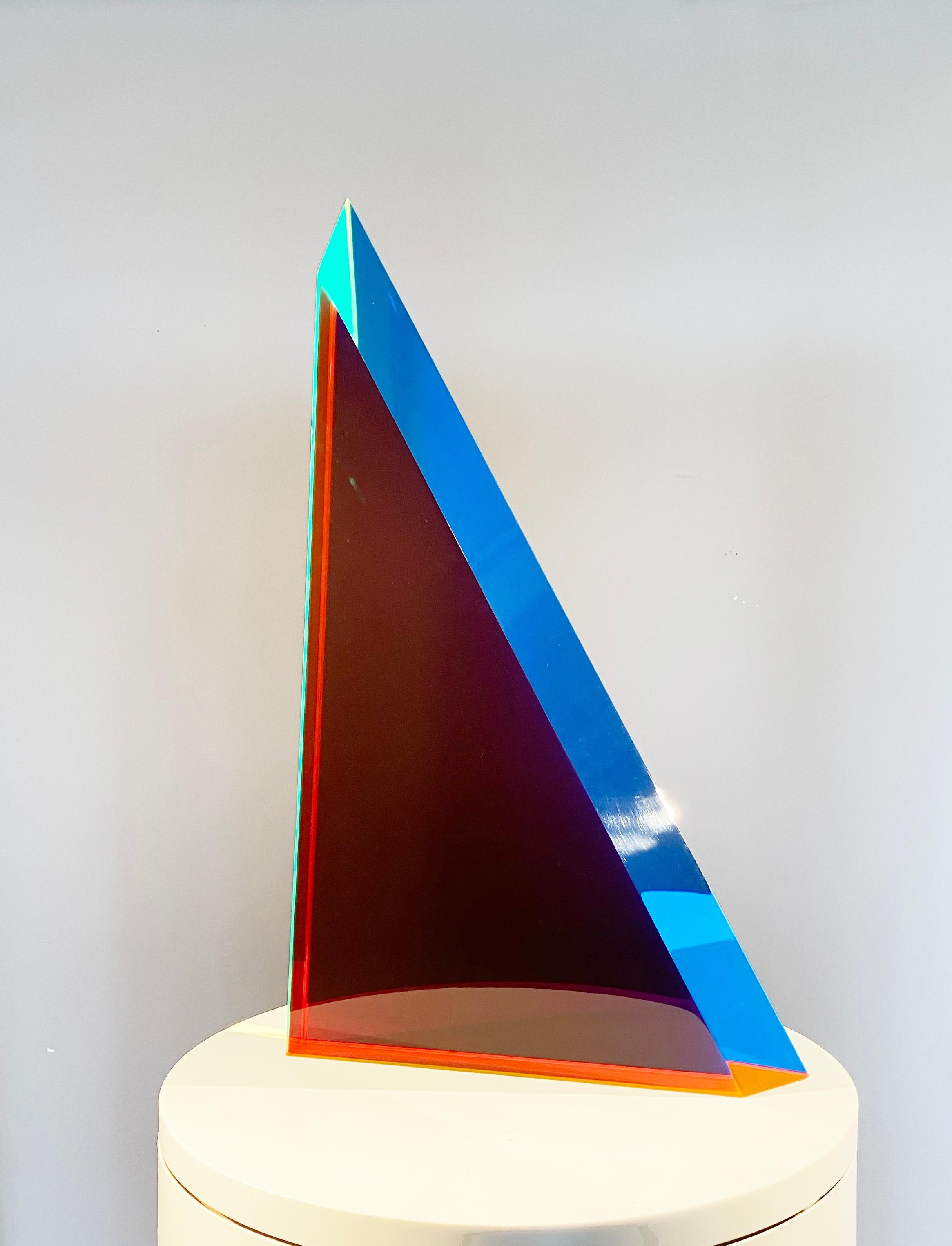 This amazing Triangular sculpture by Vasa Mihich can completely transform any spot and be future forward as well in the vision of what sculpture and 3 dimensional form can do in space.
Every inch of moving around this piece affords different color