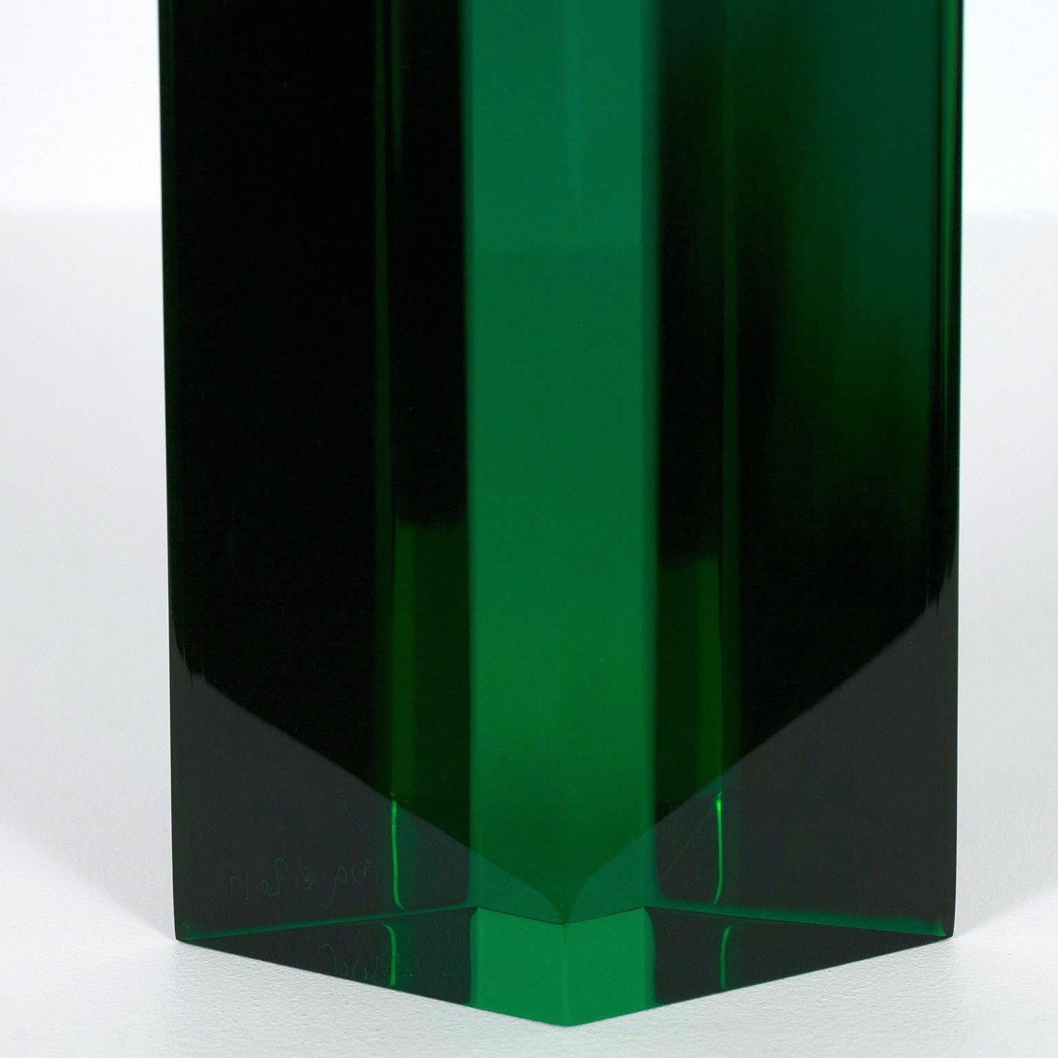 Vasa Mihich is a renowned Los Angeles based artist who is known for his sleek, colorful and captivating sculptures. His best works are composed of geometric planes of different colors suspended in acrylic. 

This work is a fantastic example of the