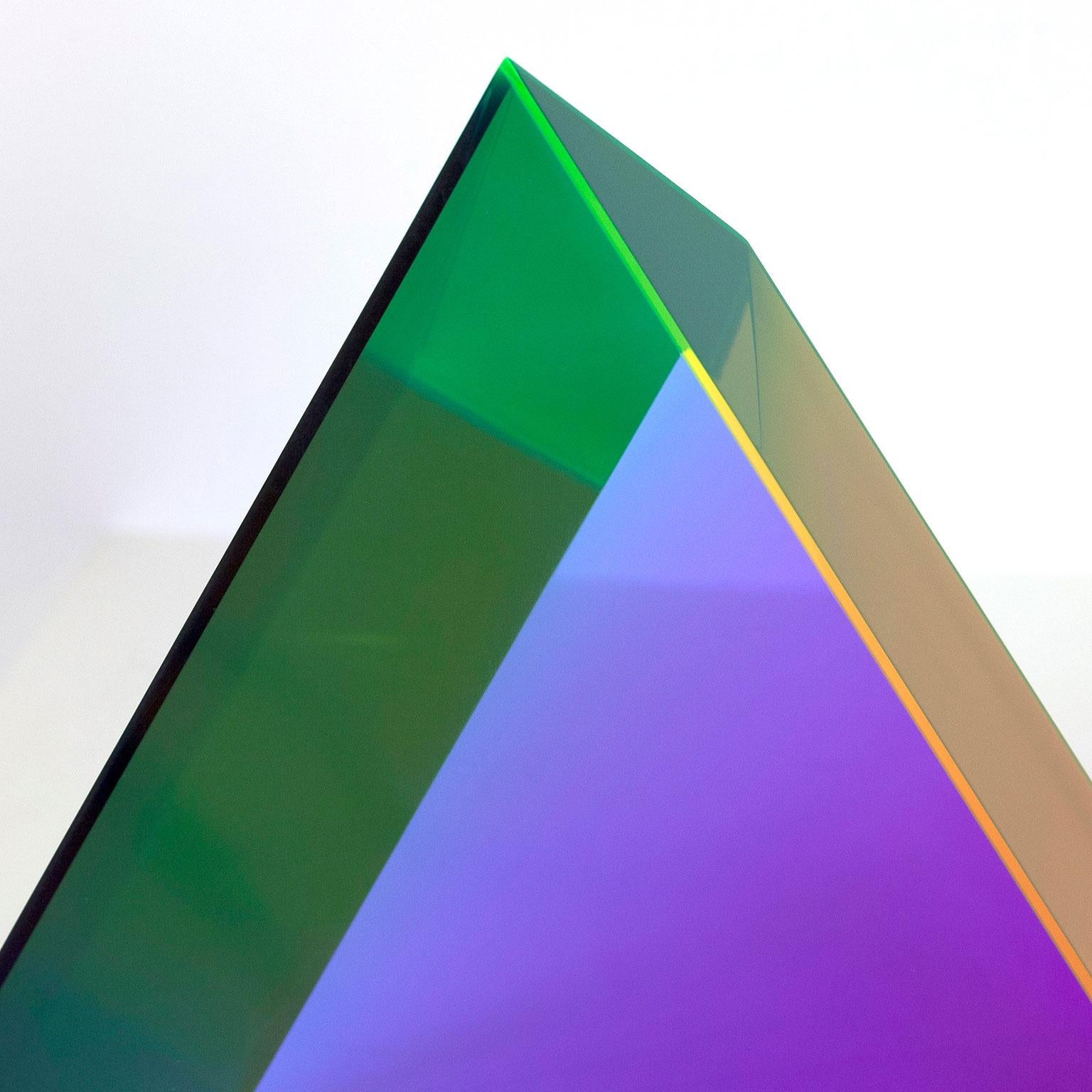 This large and dynamic color-shifting traingle is a paradigm of Vasa Mihich's mastery of acrylic. 

While one side of the triangle appears to be an equilateral, the other face presents a smaller equilateral sandwiched between two scalene forms. This