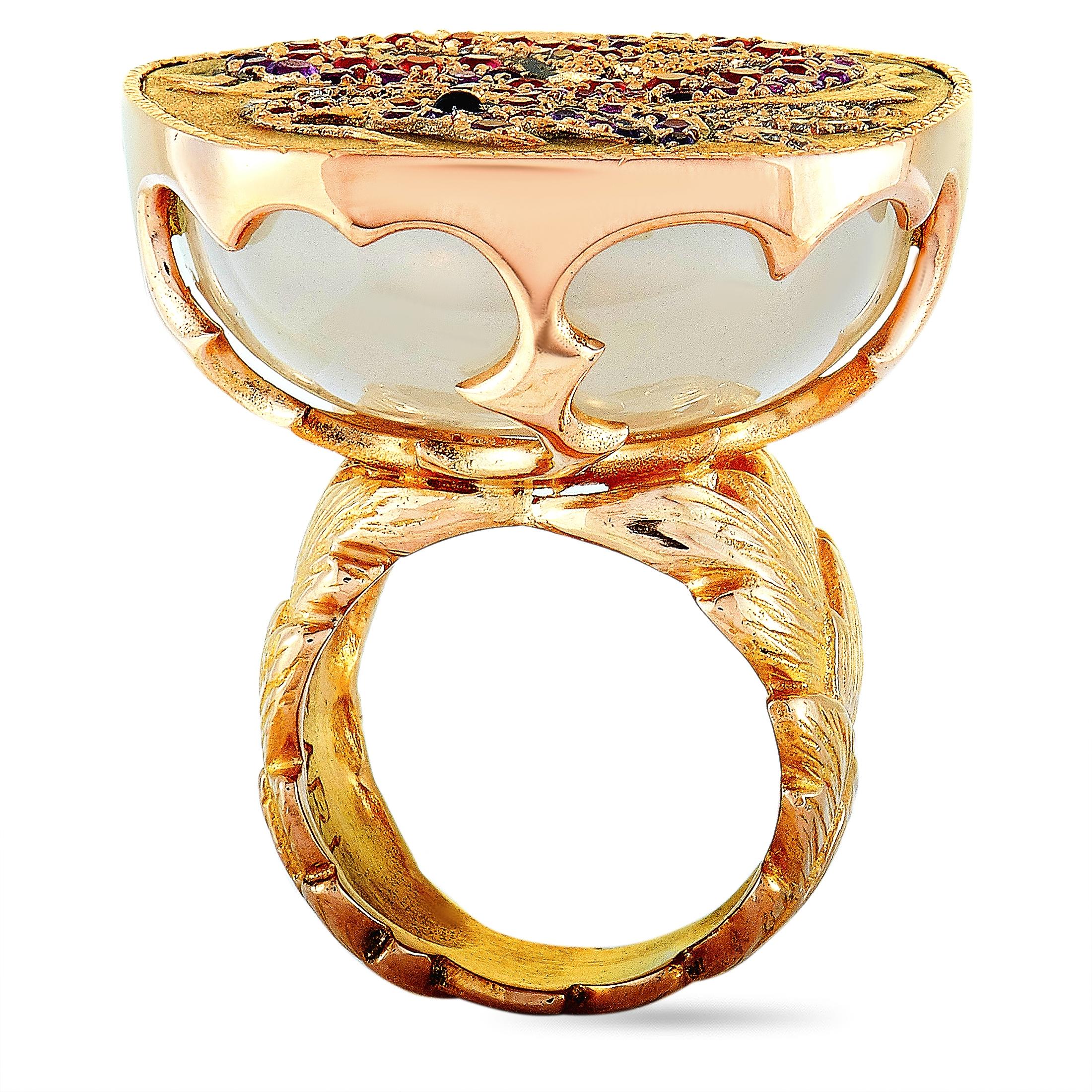 This Vasari ring is made of 18K rose gold and set with diamonds, orange and purple sapphires, and quartz. The ring weighs 37.2 grams and boasts band thickness of 7 mm and top height of 14 mm, while top dimensions measure 30 by 31 mm.
 
 Offered in