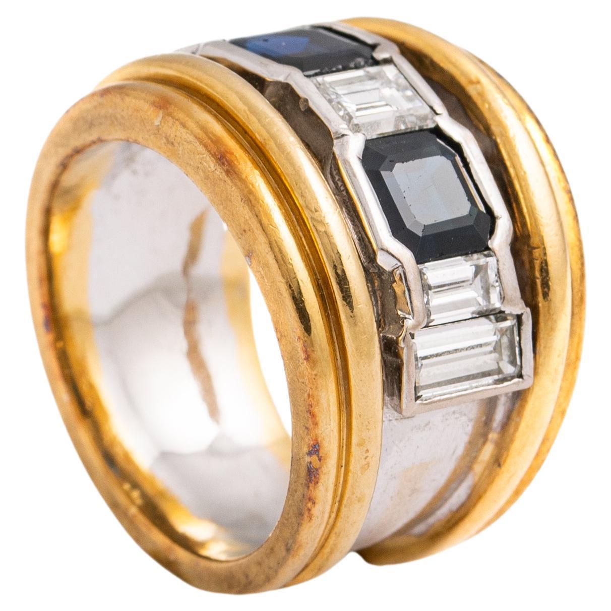 Vasari Sapphire Diamond Gold 18K Ring.
Signed Vasari.
Can be polished upon request.

Sapphire weight: approximately estimated 0.60-0.80 carat each.
Diamond total weight: approximately estimated 1.00 carat.
Total weight: 13.84 grams.
Size: 52 / 6 US.