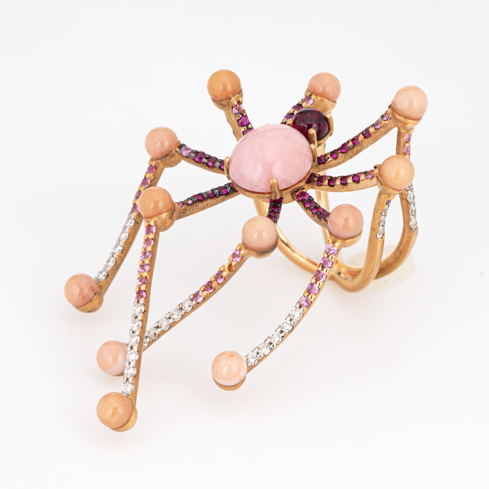 Distinct & stylish Vasari spider ring crafted in 18 karat yellow gold. 

Rubellite, pink opals and diamonds are set into the mount. The gemstones are in very good condition and free of cracks or chips.  

The elaborate spider features four