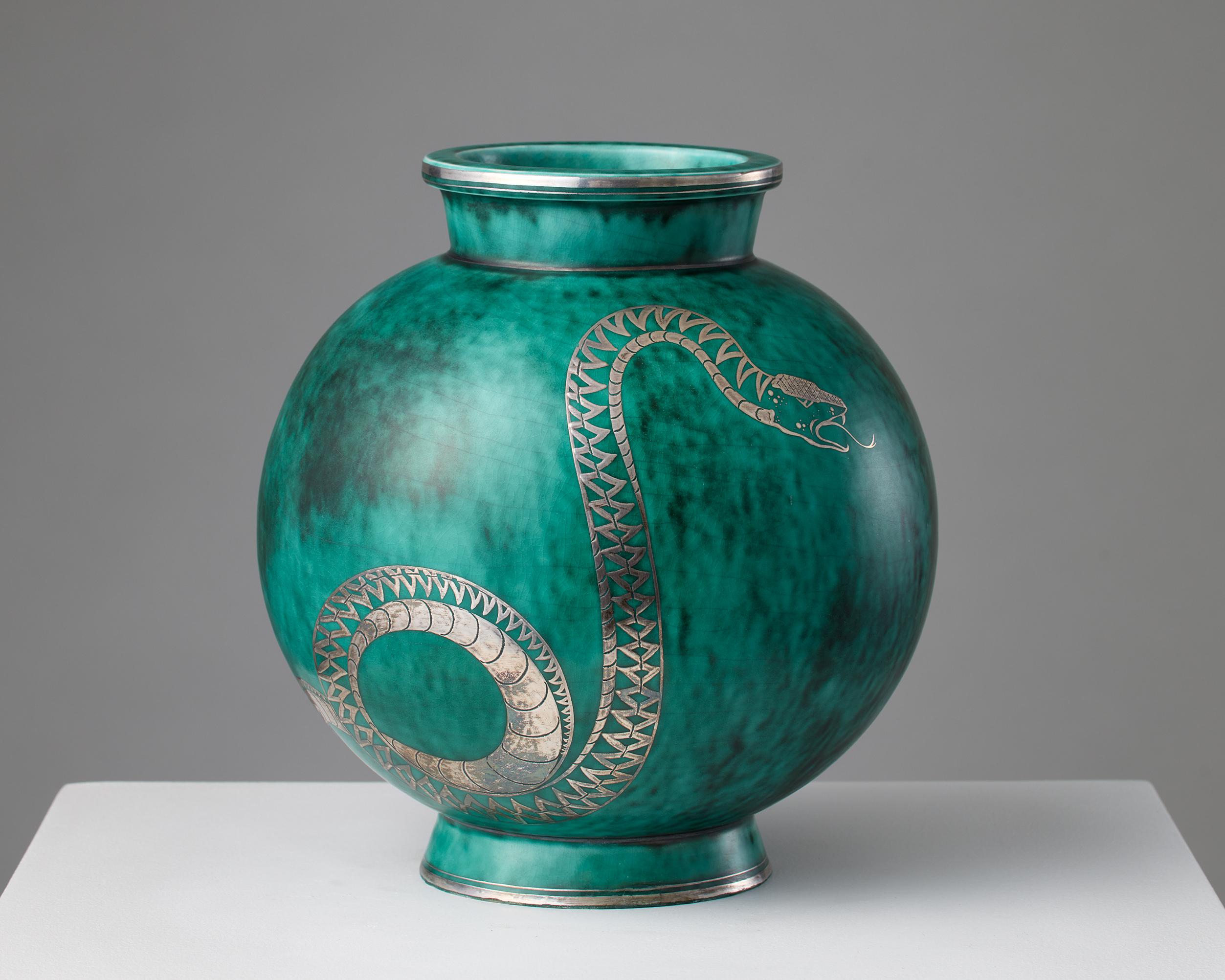 Vase ‘Argenta’ designed by Wilhelm Kåge for Gustavsberg, Sweden, 1930s

Stoneware with silver decor.

Signed.

H: 22.5 cm / 8 7/8