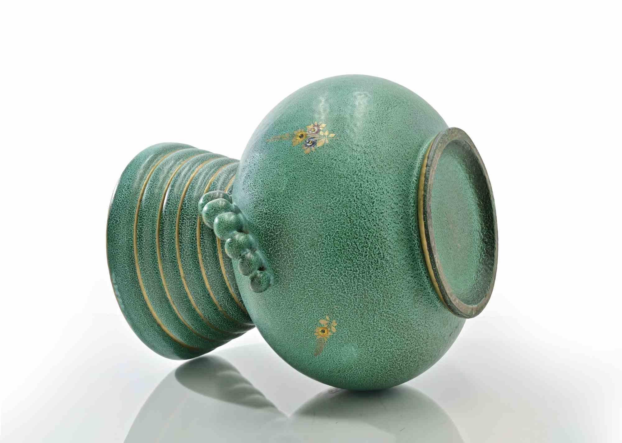 Bellissimo vaso in ceramica attribuito a Gabriele Bicchioni e realizzato negli anni Quaranta.

Condizioni eccellenti.
