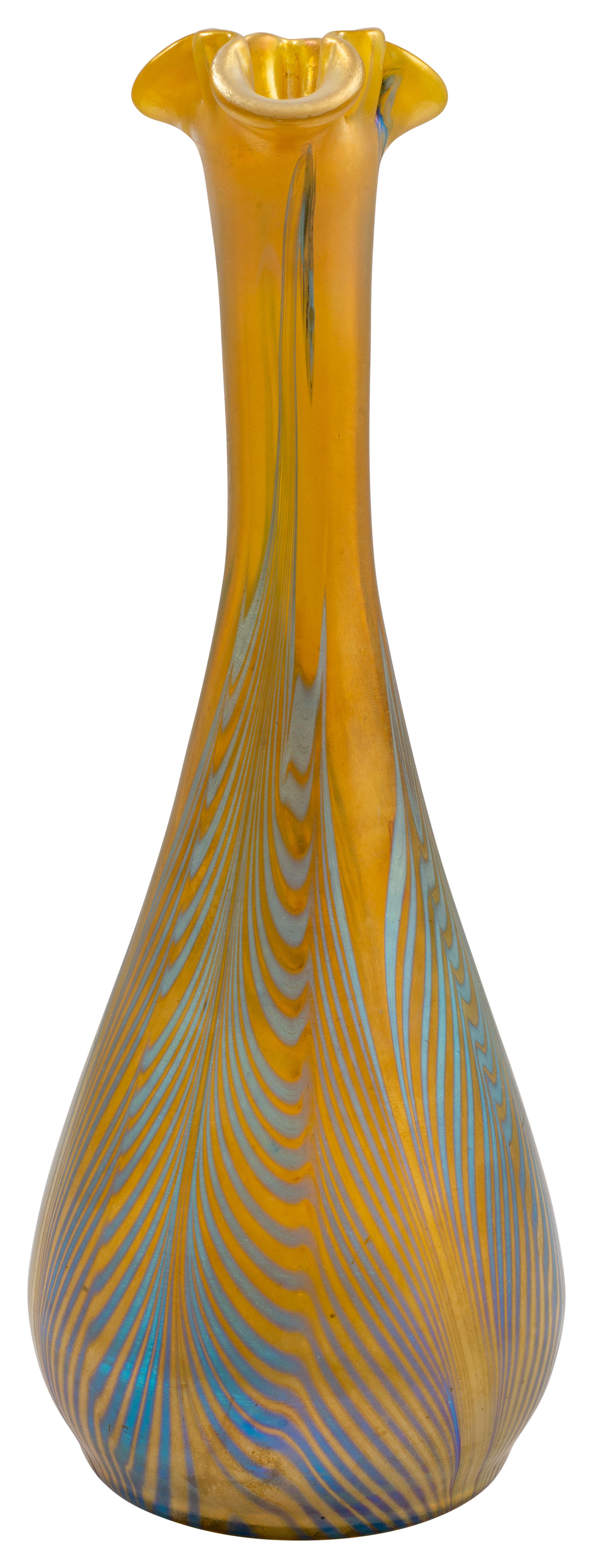 Vase Austrian Jugendstil Johann Loetz Witwe mouth-blown glass circa 1901 blue yellow PG 1/154

One of the main reasons for the big success of Loetz at the Paris World Exhibition in 1900 was the use of bright, colorful decorations later to be known