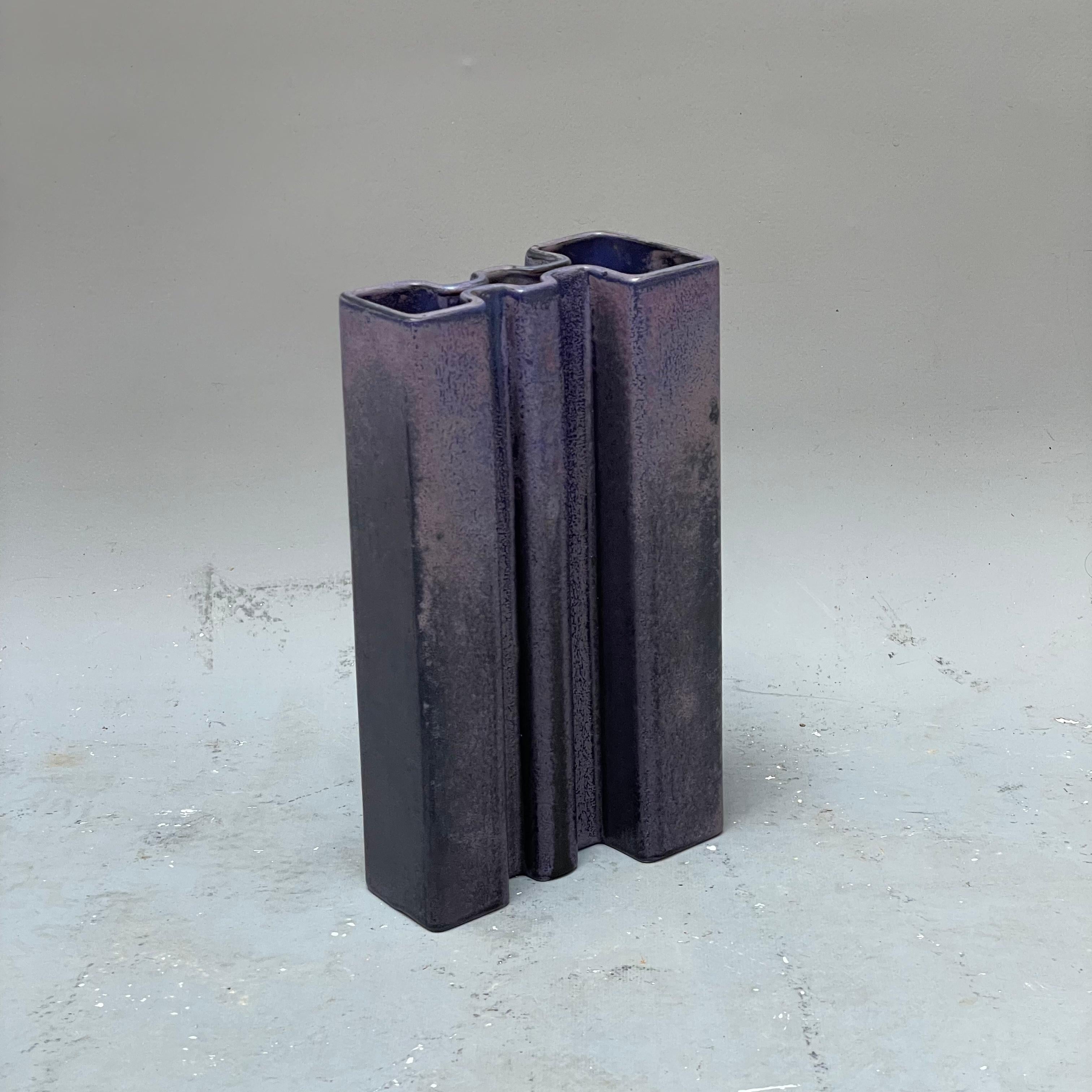 Angelo Mangiarotti was an Italian architect and designer known for his work in furniture and product design. He created a number of elegant and minimalist vases that are highly regarded for their simple, yet refined designs.
Mangiarotti's vase