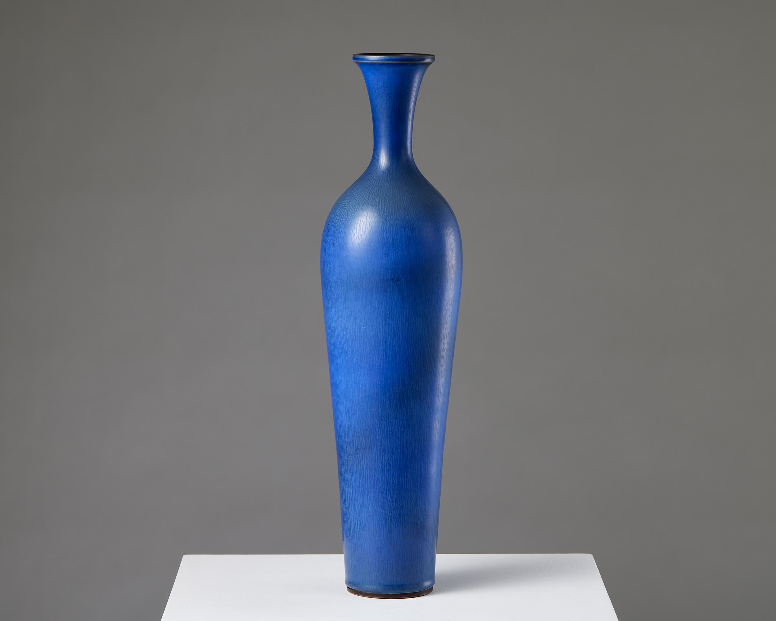 Vase by Berndt Friberg for Gustavsberg,
Sweden, 1956.

Stoneware.

Signed.

H: 47 cm / 18 1/2’’
D: 11 cm / 4 1/2’’

Provenance: From a private Swedish collection.

Berndt Friberg was born in the southern Sweden town of Hoganas. He came from a long