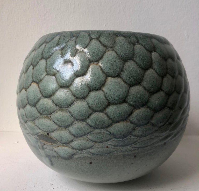 Beautiful impressive and big vase / bowl by Gerald and Gotlind Weigel. The structure of the glaze is developed by using a net. It is signed by Weigel and the impressed workshop mark and 1984.