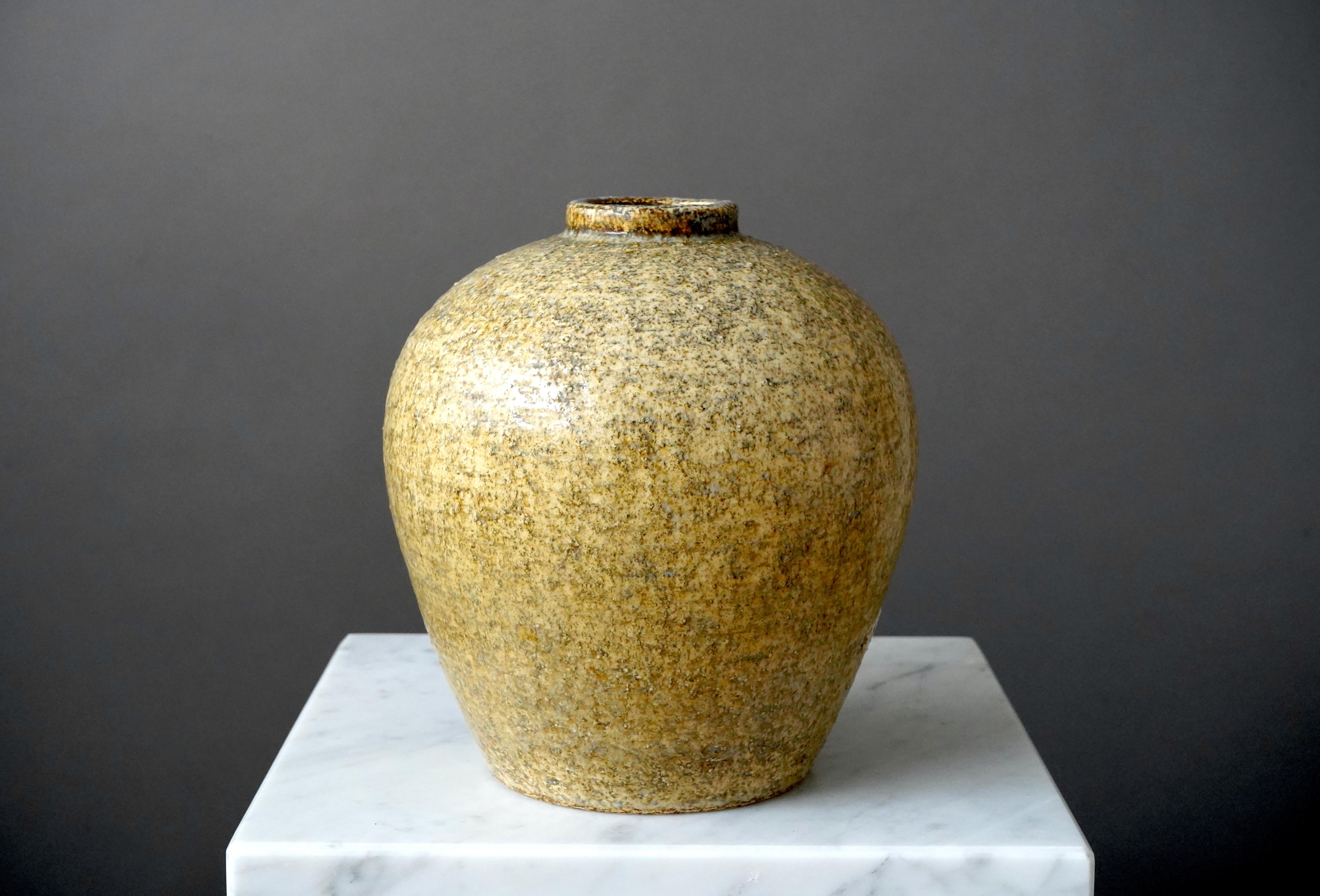 Beautiful and rare stoneware vase designed by Gertrud Lönegren.
This studio piece was created at Rorstrand in Sweden between 1936-1941.

Excellent condition. Stamped 'Rörstrand / Lönegren'.

Gertrud Lönegren was a Swedish ceramist born in 1905