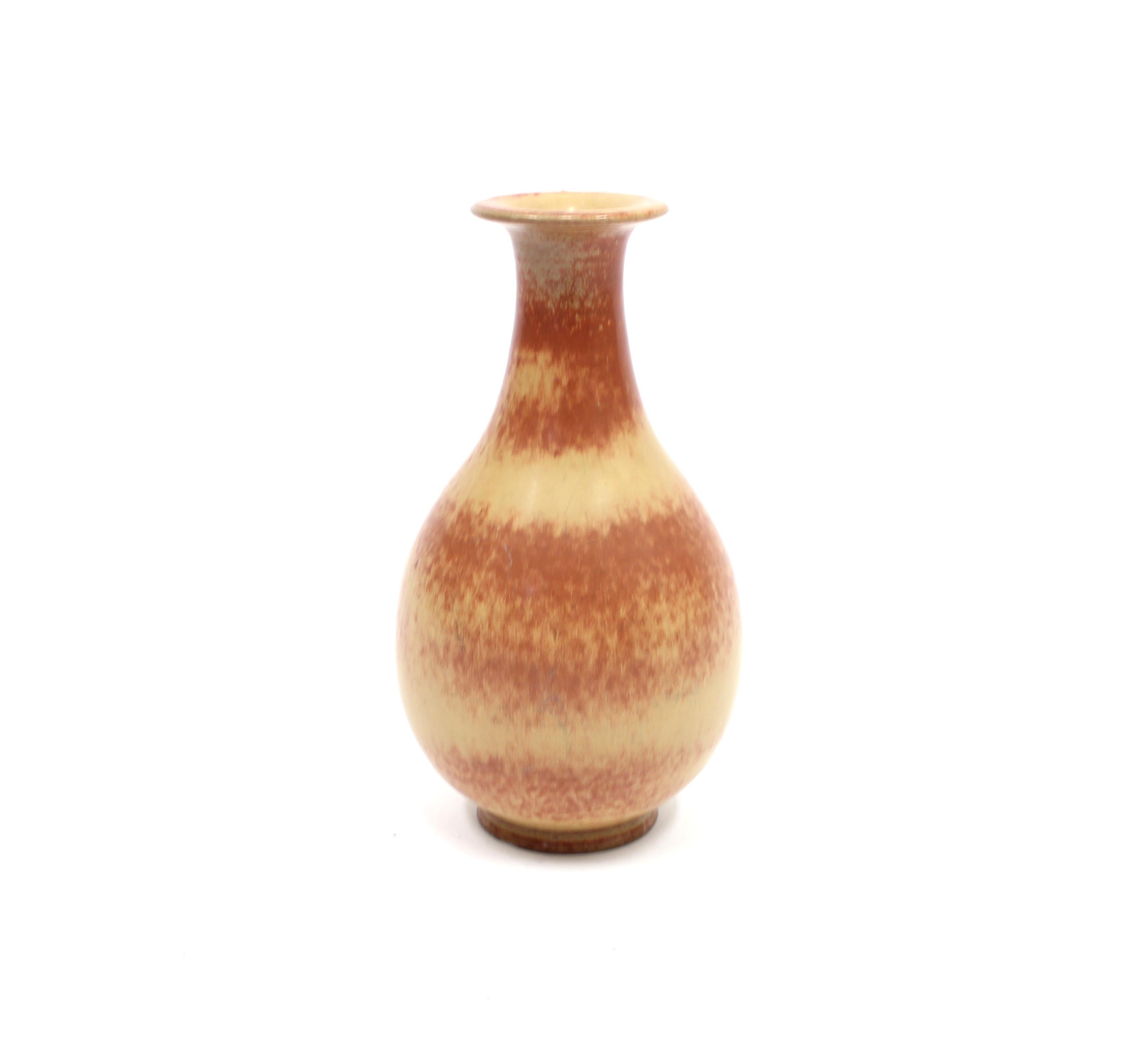 Yellow and red stoneware vase by Gunnar Nylund for Rörstrand, 1950s. Overall very good condition wit ware consistent with age and use. A few small shallow scratches and marks may occur. Very small manufacturing glaze defect on top.