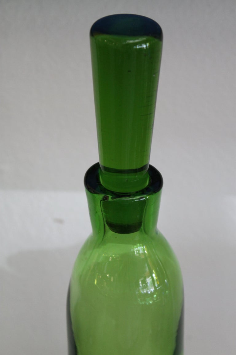 Joel Myers colored glass vase with stopper, model no. 6427, 1960s. Manufactured by Blenko. Vessel measures 25