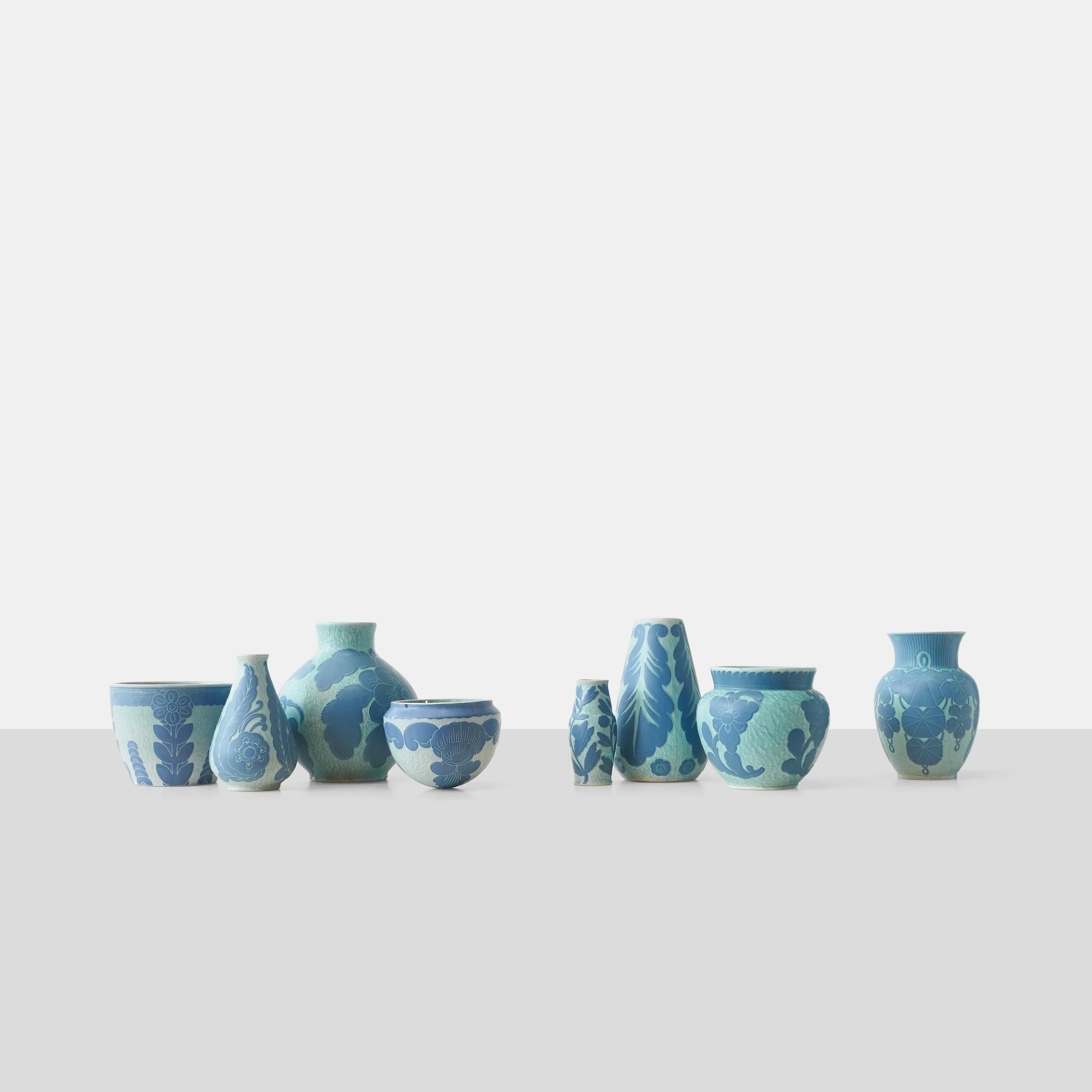 A handmade blue vase by Josef Ekberg for Gustavsberg. Each piece is unique and decorated with the Sgrafitto technique that was developed by Ekberg himself.

Signed on base : Gustavsberg, 1920, JE.