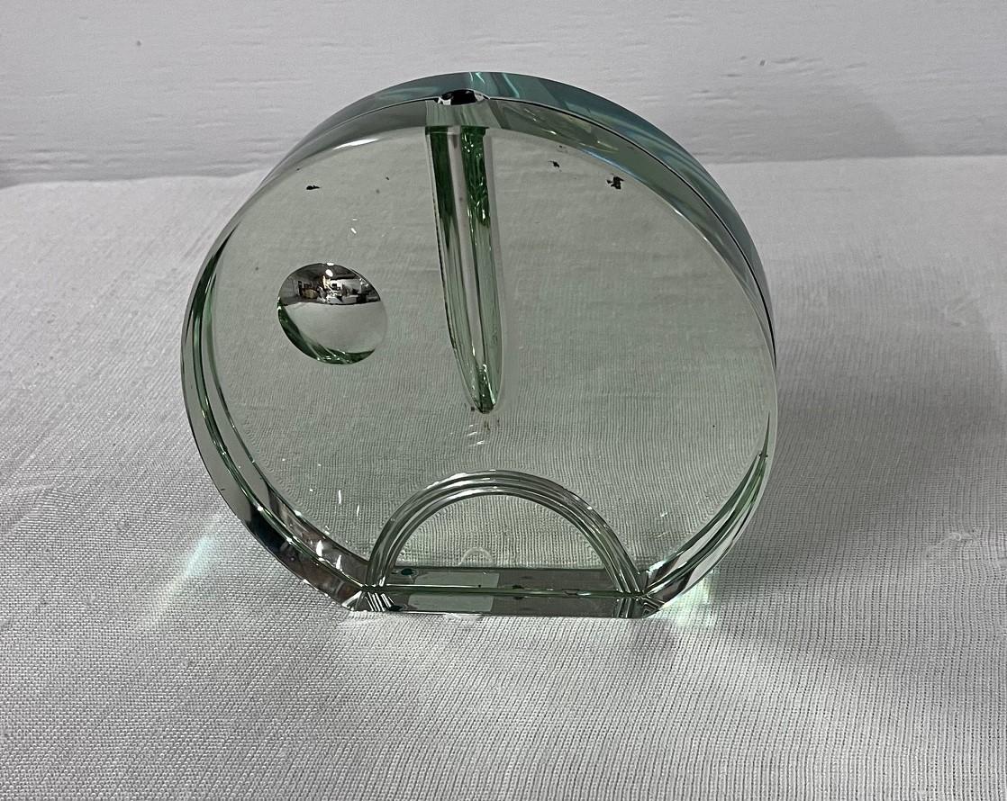 Vase designed by the Italian designers Luigi Radice and Pierangelo Gallotti in the 1960s. Green circular vase made of chromed metal and cut crystal.