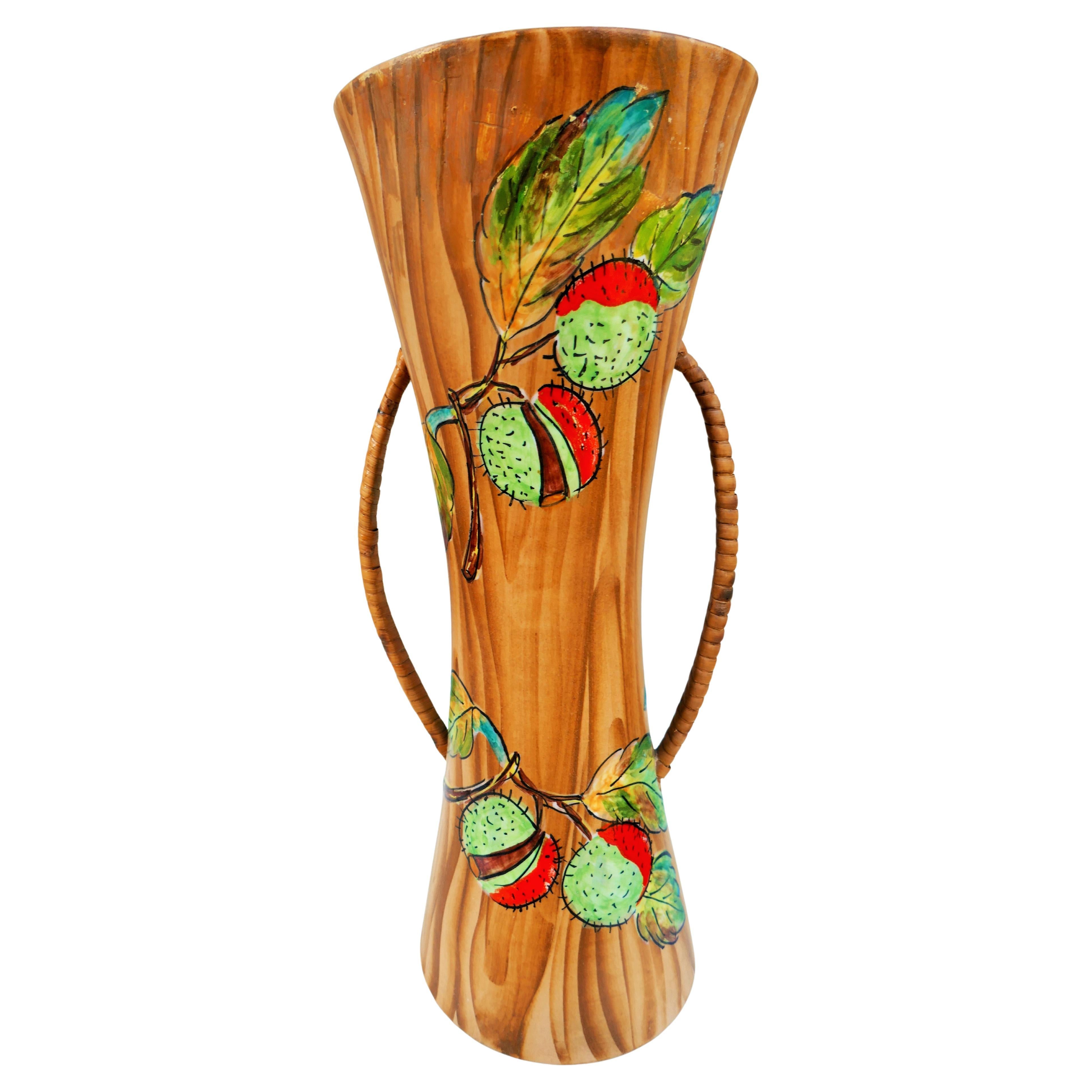 Ceramic and rattan vase by Rometti Umbertide.
Defects as per photo.
Thank you