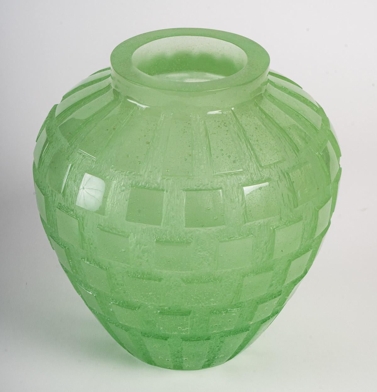 Big glass vase made by Daum in light green acid etched pate de crystal with a design of cubes. 

Engraved 
