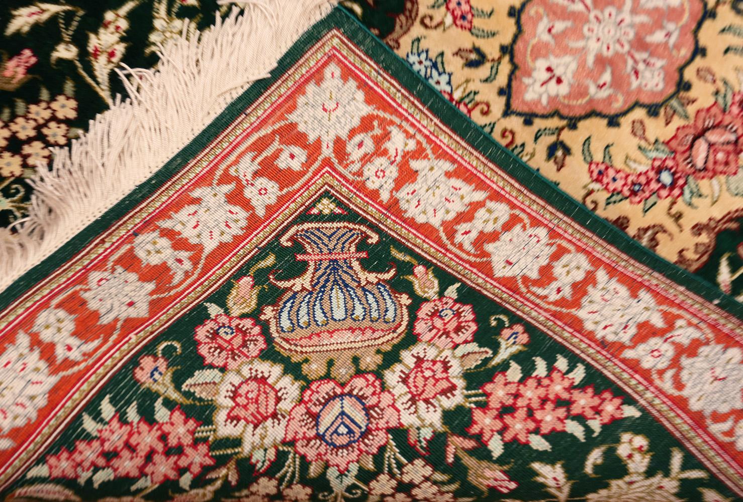 Beautiful Green Background Vase Design Small Floral Vintage Silk Persian Qum Rug , Country of Origin / Rug Type: Vintage Persian Rug, Circa Date: Late 20th Century - Size: 2 ft x 3 ft (0.61 m x 0.91 m).