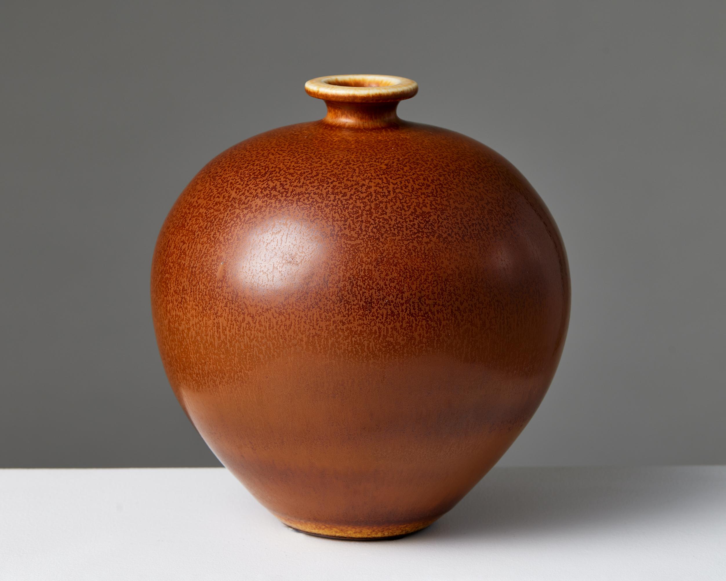 Vase designed by Berndt Friberg for Gustavsberg,
Sweden, 1969.

Stoneware.

Signed.

Measures: H: 20 cm / 8''
D: 18 cm / 7''.

Berndt Friberg was born in the southern Sweden town of Hoganas. He came from a long line of ceramists, in an area steeped