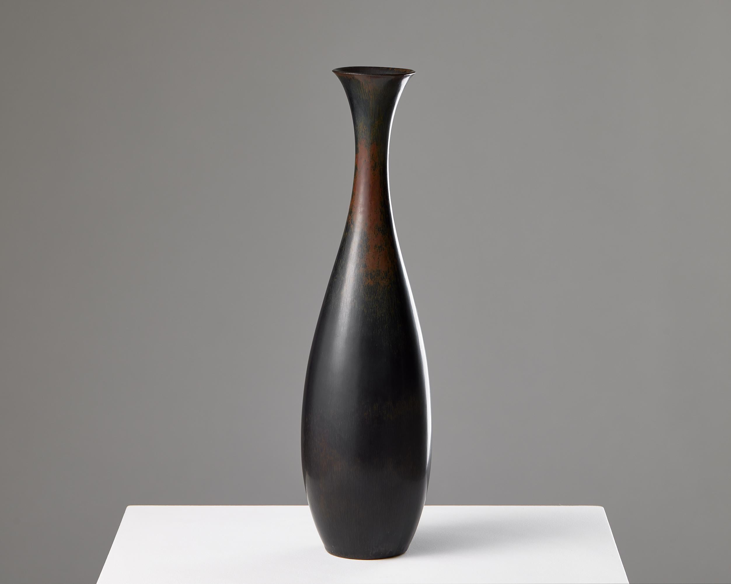 Vase designed by Carl-Harry Stålhane for Rörstrand,
Sweden, 1950s.

Stoneware.

Signed.

Measures: H: 36 cm / 14 1/4''
W: 10 cm / 4''