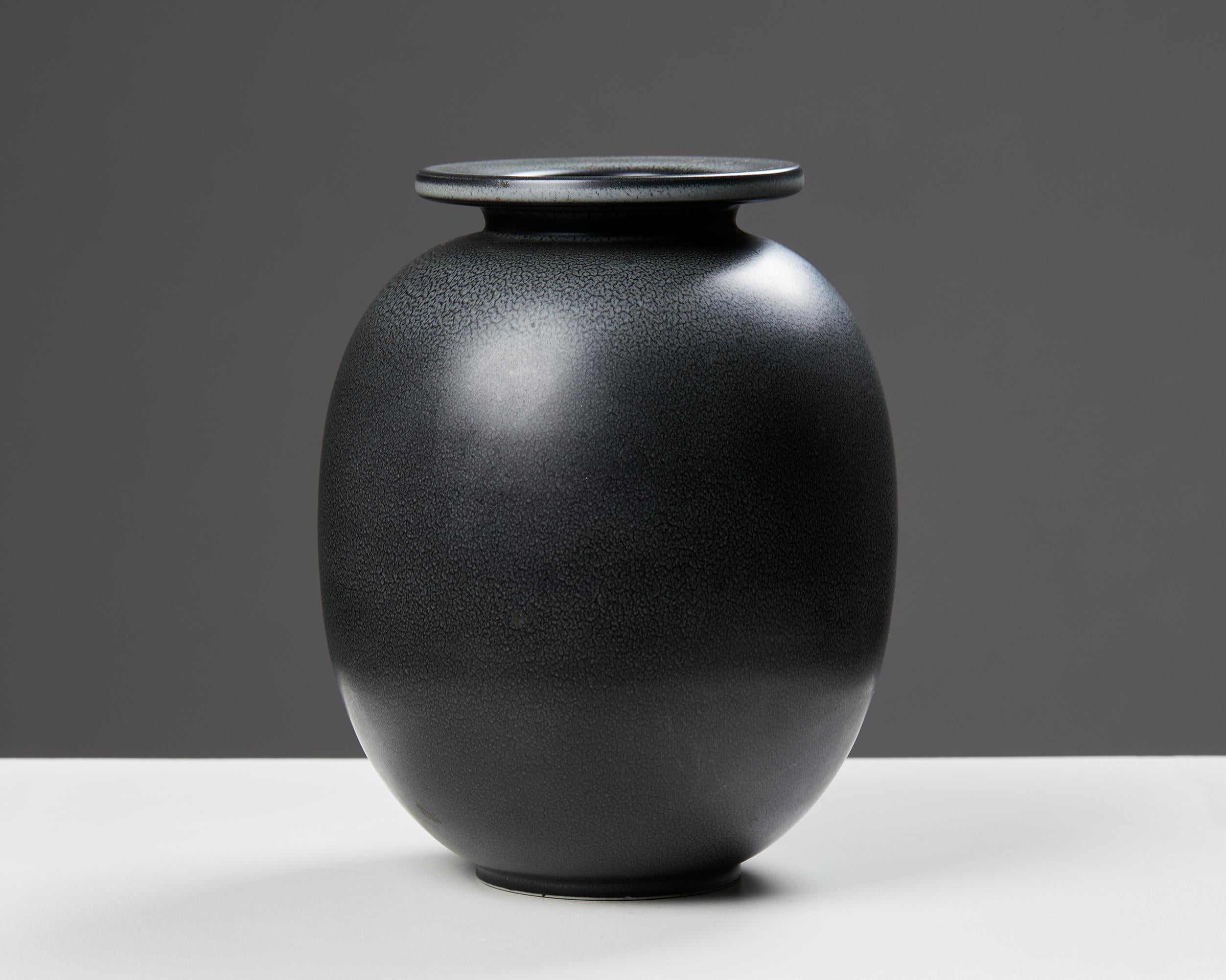 Vase designed by Gunnar Nylund for Rörstrand,
Sweden, 1950s.
Stoneware.

Signed.

Measures: H: 20.5 cm / 8”
Diameter: 16.5 cm / 6 1/2