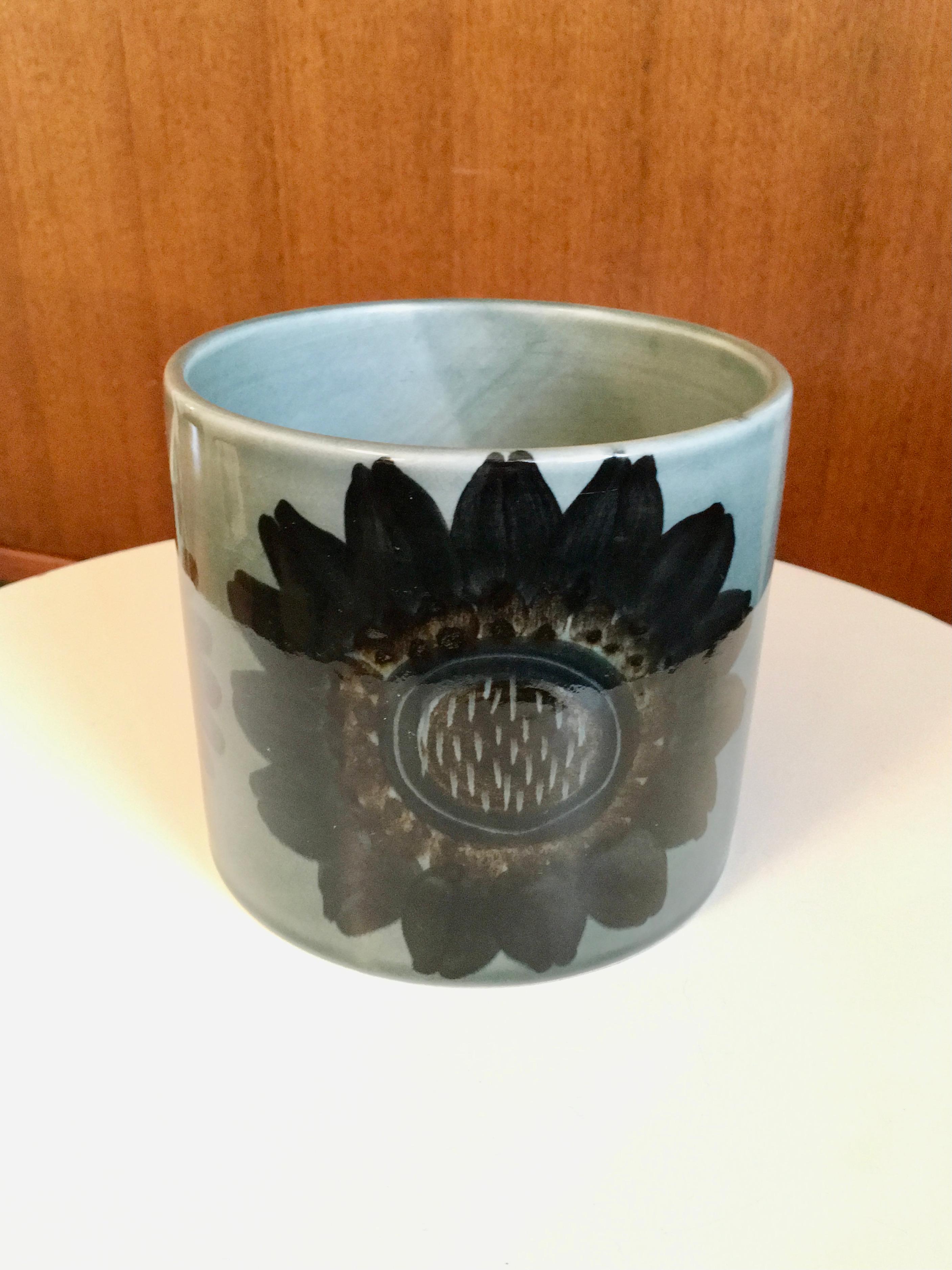 DESCRIPTION

A blue / grey vase designed by Gunvor Olin-Grönqvist for Arabia, made in Finland.  The vase measures approximately 5 3/8 inches in diameter and is 4 7/8 inches tall.  The vase is marked on the bottom.

ABOUT THE ARTIST

Gunvor