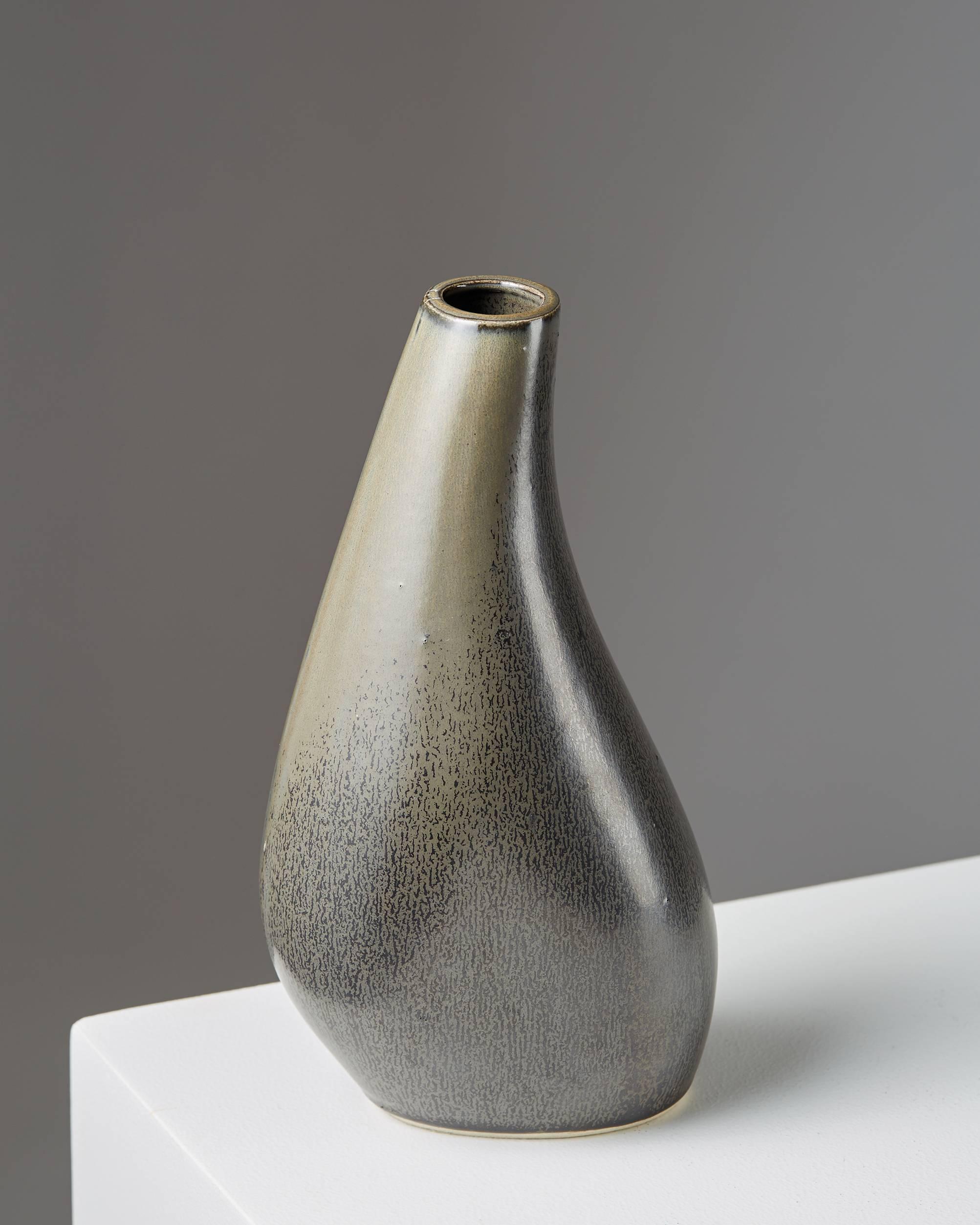 Vase designed by Kumakura Junkichi, 
Japan, 1970s.
Stoneware.

Measures: H 24 cm/ 9 1/2