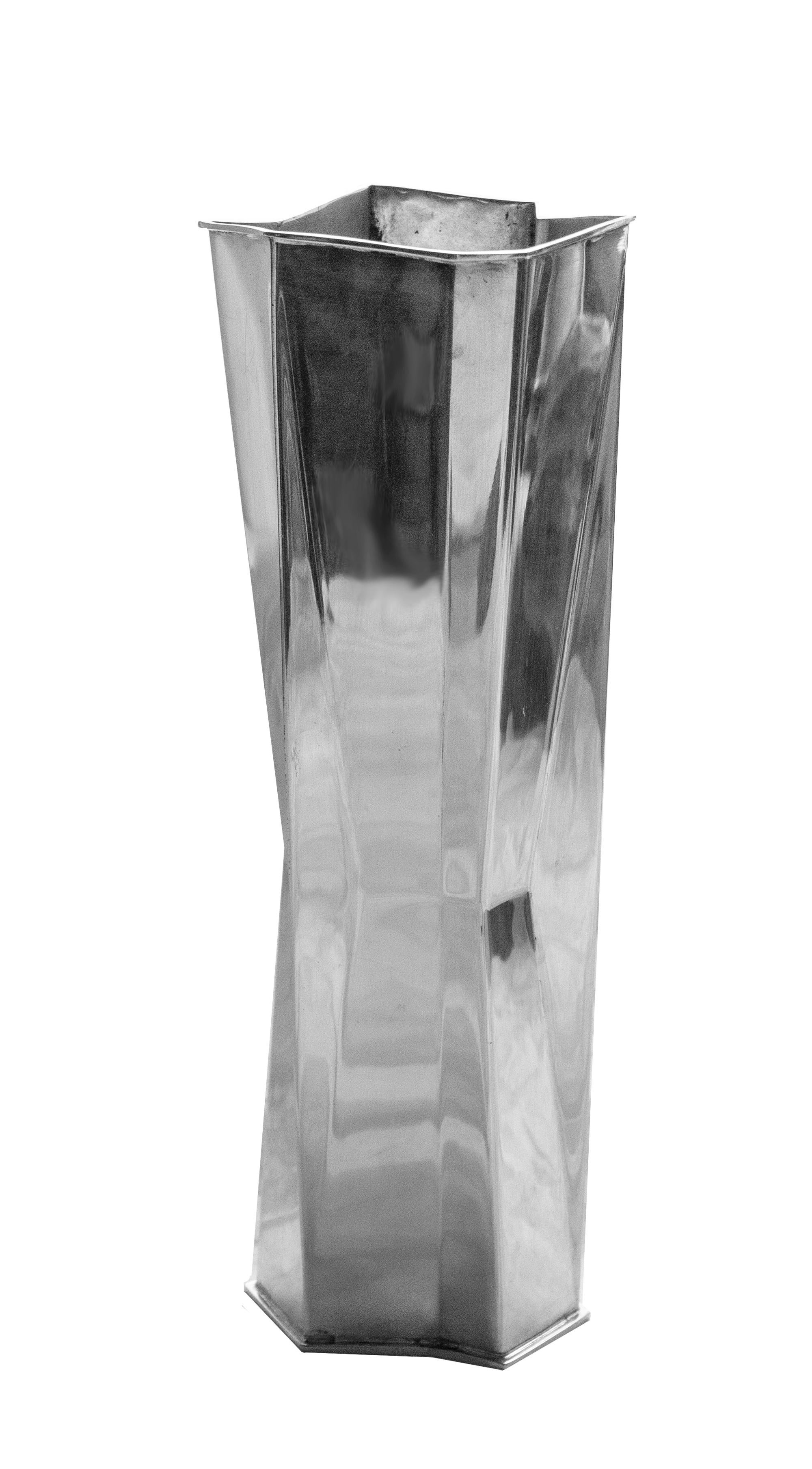 Vase designed by the great artist Tapio Wirkkala, Kultakeskus OY, Hämeenlinna, Finland, 1973. Made in sterling silver. Irregular shape. Stamped, monogram signed. Swedish import stamped. Surface wear. Weight 352 g.