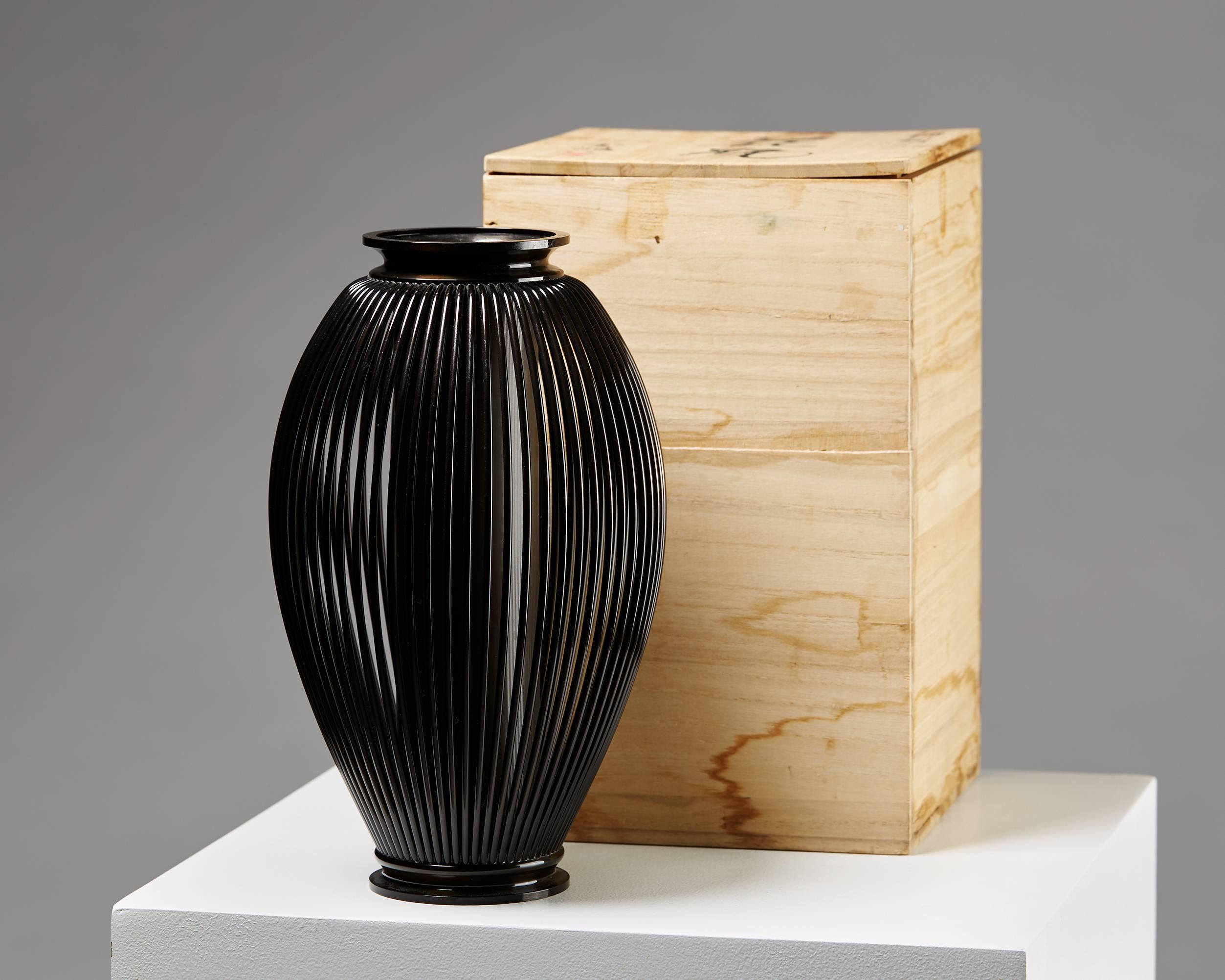 Vase designed by To-Ryo, 
Japan, 2000s. 
Bronze.

Loose liner. Kiri wood box enclosed.

Stamped.
 